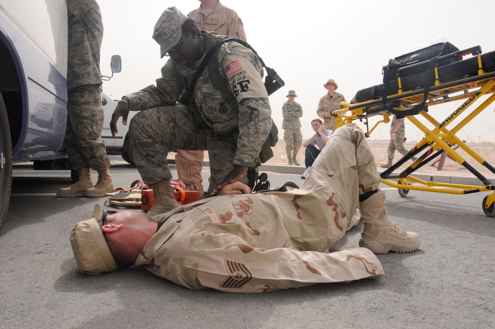 379th Expeditionary Security Forces Squadron members respond to simulated emergencies during a Major Accident Response Exercise here March 20. (U.S. Air Force photo/Senior Airman Domonique Simmons) 
