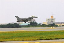 KADENA AIR BASE, Japan --  An F-16 Falcon comes in for a landing during the wing’s operational readiness inspection March 13. F-16 pilots from Kunsan Air Base, Republic of Korea flew training missions against Kadena’s F-15 Eagles during a two-week training integration. The training allowed pilots from both bases to exercise their capabilities and create a formidable force of air superiority. (U.S. Air Force photo/Staff Sgt. Chrissy FitzGerald)
