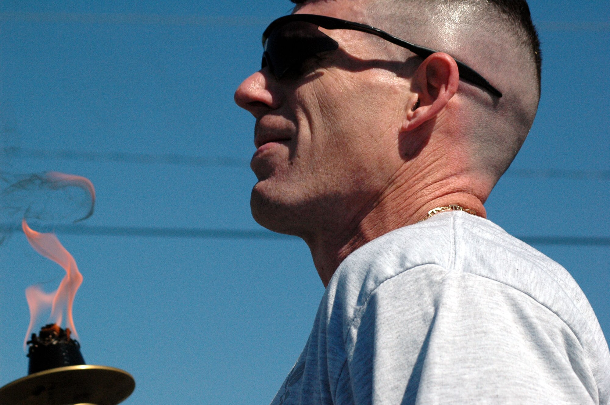 Capt. Michael Small runs the entire Torch Run across Eglin. The Florida Torch run is a grass roots program supported by local police departments as a fundraiser for the Special Olympics.  (U.S. Air Force Photo by Airman 1st Class Anthony Jennings)