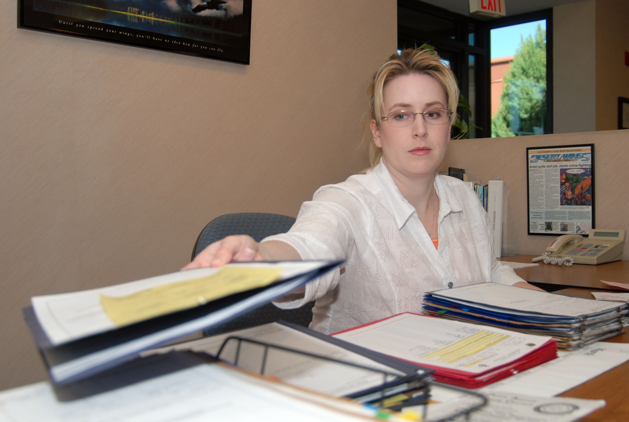 Lisa Camplin, 95th Security Forces Squadron commander secretary, is the Air Force Flight Test Center Secretarial and Clerical Civilian of the Year. Among her accomplishments during the year, Mrs. Camplin provided secretarial support to Edwards’ largest squadron, consisting of 294 security forces, 100 contractors, 50 civilians and 50 individual mobilization augmentees. She also provided administrative and family support to 149 security forces Airmen. (Air Force photo by Senior Airman Julius Delos Reyes)