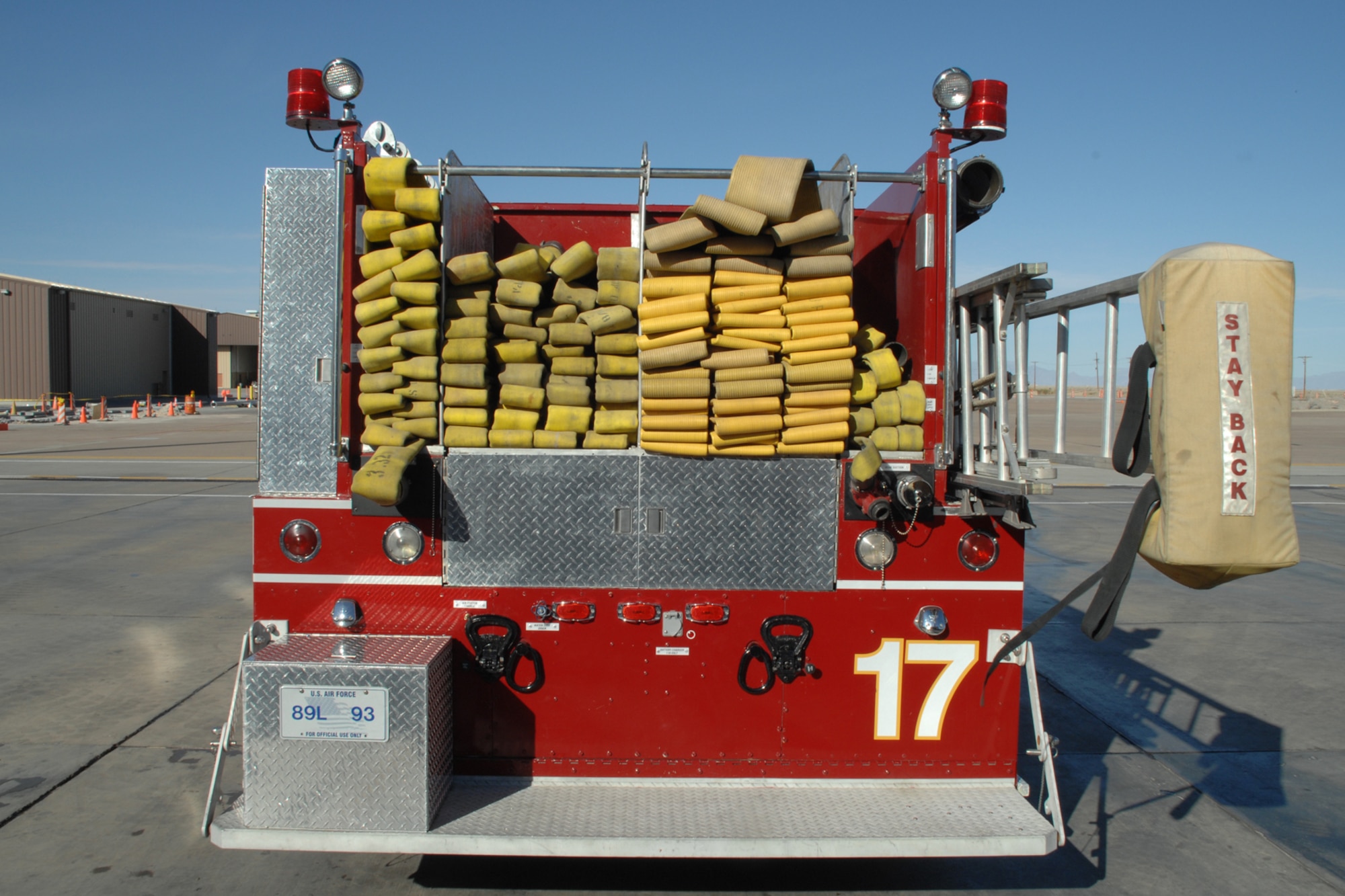 The backside of the truck was modified to make room for more storage compartments. Also, added to each side of the truck where F-22A boarding ladders. 