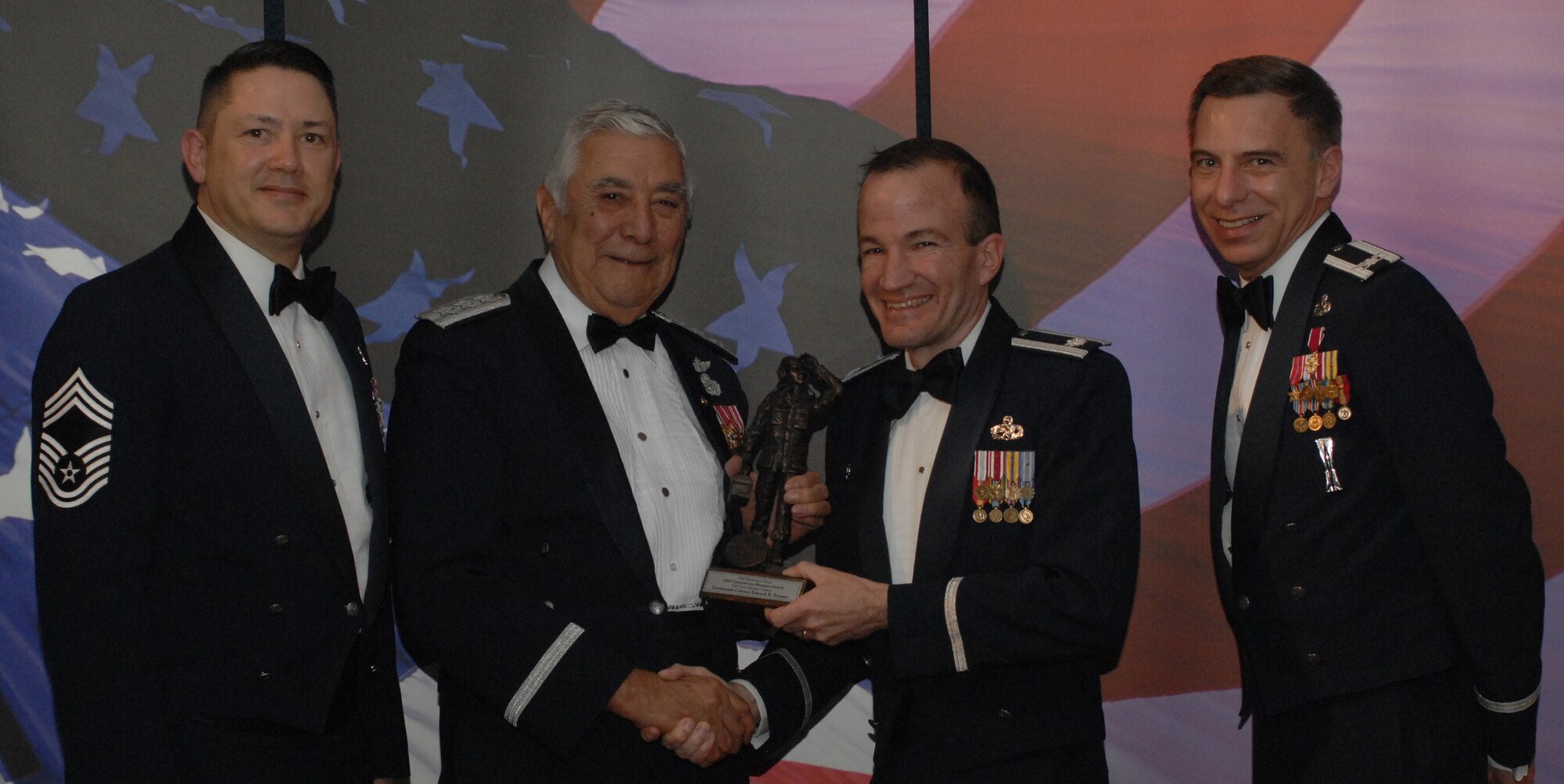 Lt. Gen. Leo Marquez Award FieldGrade Officer Category
(from left) Chief Master Sgt. Gregory Blue, 100th Maintenance Group chief enlisted manager; Lt. Gen. Leo Marquez; Lt. Col. Edward Karmer, 100th Maintenance Group and award recipient; and Col. Michael Seville, 100th Maintenance Group commander. (U.S. Air Force photo by Airman 1st Class Brad Smith) 