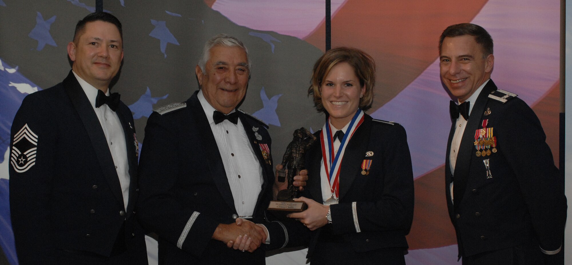 Lt. Gen. Leo Marquez Award Company Grade Officer Category
(from left) Chief Master Sgt. Gregory Blue, 100th Maintenance Group chief enlisted manager; Lt. Gen. Leo Marquez; 1st Lt. Kathryn Swenson, 100th Maintenance Operations Squadron and award recipient; and Col. Michael Seville, 100th Maintenance Group commander. (U.S. Air Force photo by Airman 1st Class Brad Smith) 