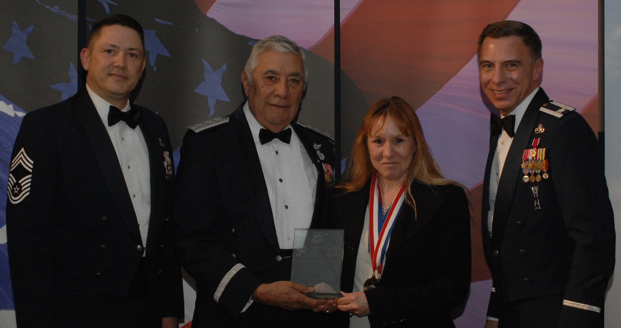 2007 Maintenance Group Annual Award Winner Civilian Supervisor
(from left) Chief Master Sgt. Gregory Blue, 100th Maintenance Group chief enlisted manager; Lt. Gen. Leo Marquez; Lori Augustine, 100th Maintenance Group and award recipient; and Col. Michael Seville, 100th Maintenance Group commander. (U.S. Air Force photo by Airman 1st Class Brad Smith)