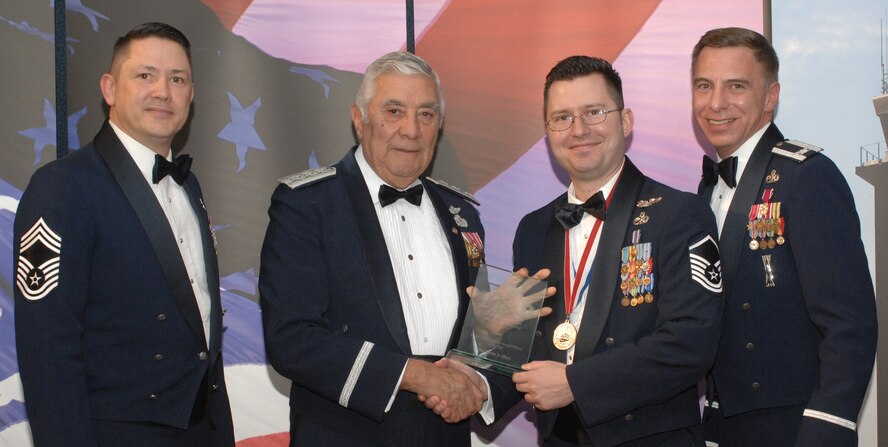 2007 Maintenance Group Annual Award Winner Senior NCO Category (from left) Chief Master Sgt. Gregory Blue, 100th Maintenance Group chief enlisted manager; retired Lt. Gen. Leo Marquez; Master Sgt. James Mays, 100th Aircraft Maintenance Squadron and award recipient; and Col. Michael Saville, 100th Maintenance Group commander. (U.S. Air Force photo by Airman 1st Class Brad Smith)