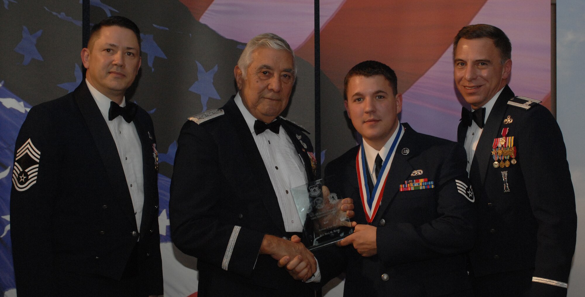 2007 Maintenance Group Annual Award Winner Airman Category
(from left) Chief Master Sgt. Gregory Blue, 100th Maintenance Group chief enlisted manager; Lt. Gen. Leo Marquez; Senior Airman Paul Ryan, 100th Aircraft Maintenance Squadron and award recipient; and Col. Michael Seville, 100th Maintenance Group commander. (U.S. Air Force photo by Airman 1st Class Brad Smith)