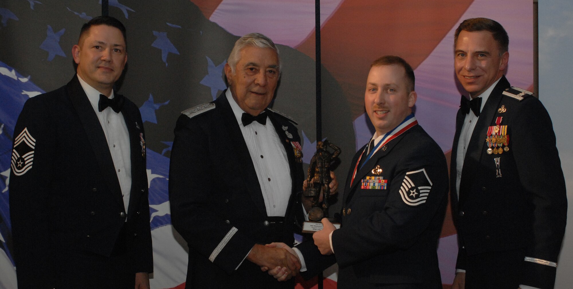 Maintenance Training Manager
(from left) Chief Master Sgt. Gregory Blue, 100th Maintenance Group chief enlisted manager; Lt. Gen. Leo Marquez; Master Sgt. John Westfall, 100th Maintenance Operations Squadron and award recipient; and Col. Michael Seville, 100th Maintenance Group commander. (U.S. Air Force photo by Airman 1st Class Brad Smith)