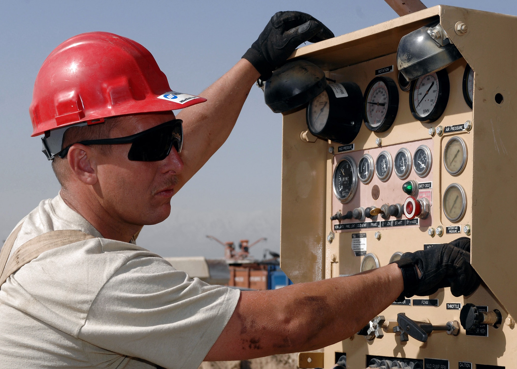 Master Sgt. John Moreland checks the gauges on a water-well digging rig during an operational check March 21 at Bagram Air Base, Afghanistan. More than $400,000 of damage to the rig was repaired at a cost of $80. Sergeant Moreland is the 819th RED HORSE Squadron metals technology NCO in charge deployed from Malmstrom Air Force Base, Mont. (U.S. Air Force photo/Master Sgt. Demetrius Lester) 
