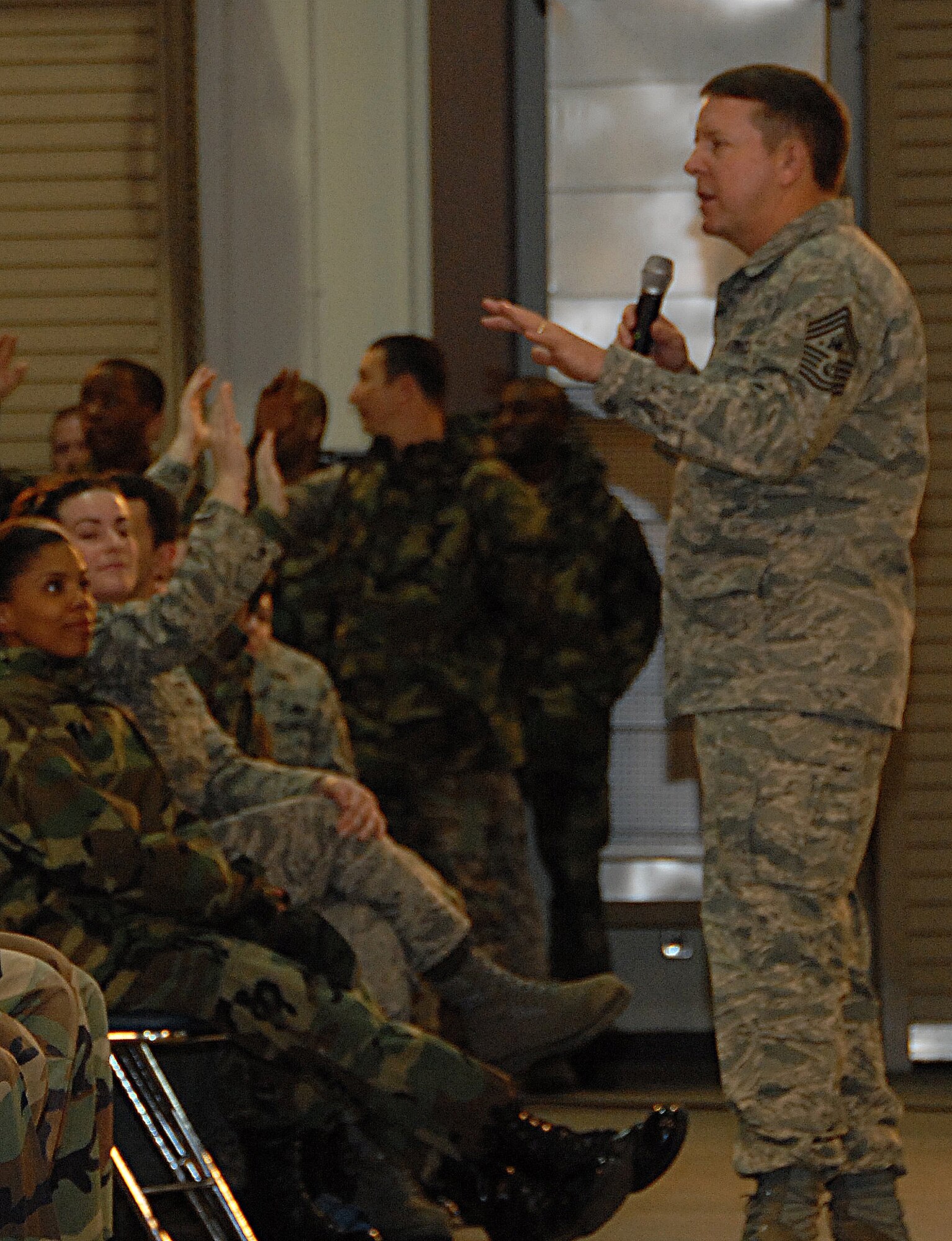 Chief Master Sergeant of the Air Force, Rodney McKinley, addresses members
of Team Osan during an Enlisted Call March 25. The chief, a former command chief master sergeant of Pacific Air Forces, made his first trip to Osan since assuming his post as the 15th chief master sergeant of the Air Force in June of 2006. During his visit, the chief discussed the Air Force's role in the Global War on Terrorism, the importance of maintaining a healthy lifestyle and how the Airman's Creed serves as the identity of Airmen throughout the Air Force. (U.S. Air Force photo/Staff Sgt. Lakisha Croley)
