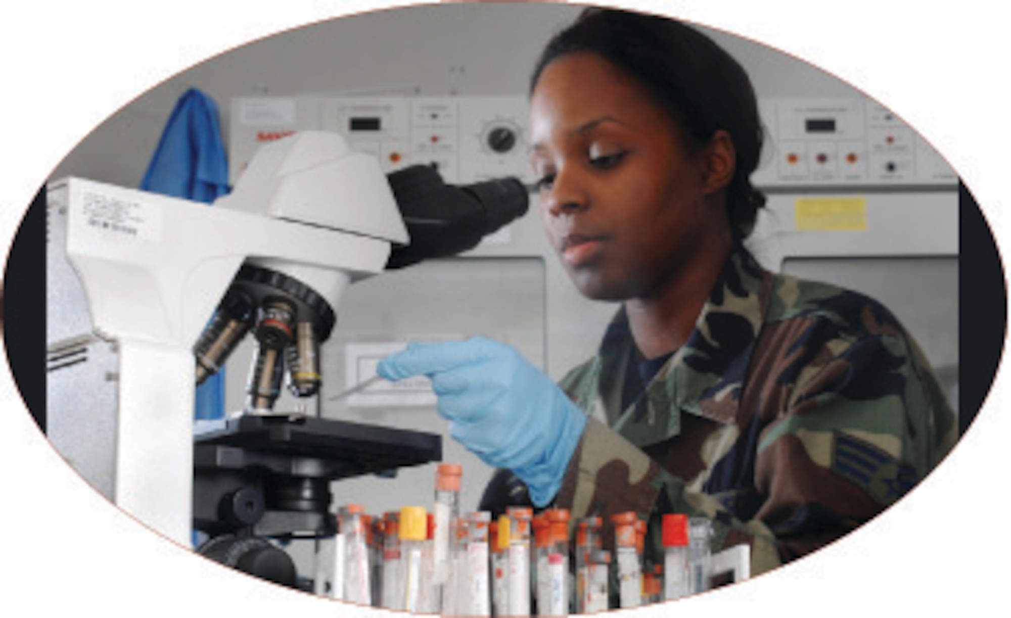 Senior Airman Adrienne Stonum, a medical technician from the 452nd Aerospace Medicine Squadron, March Air Reserve Base, Calif., uses a microscope to check abnormal cells on a specimen at the medical laboratory clinic. Microscopic examinations are used to identify possible bacterial infections and cancerous cells. Laboratory technicians test and analyze specimens using scientific laboratory techniques to aid in the diagnosis, treatment and prevention of diseases. (U.S. Air Force photo by Val Gempis)

Senior Airman Adrienne Stonum 
