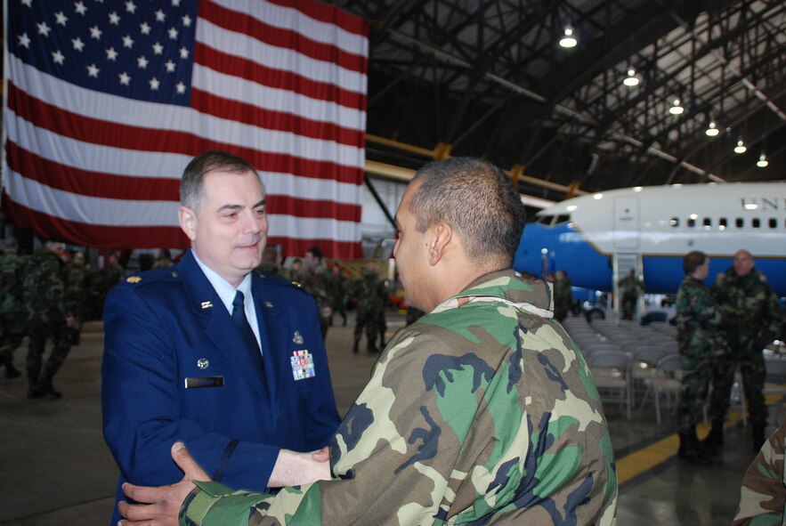 Maj. Clifford Waller, the 932nd Maintenance Squadron's new commander, greets one of the maintainers of aircraft at the 932nd Airlift Wing. Major Waller assumed command at the March unit training assembly and thanked reservists for their work. Photo/Tech. Sgt. Dan Oliver