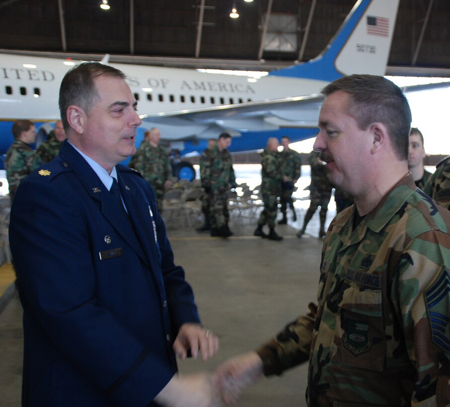 Maj. Clifford Waller, the 932nd Maintenance Squadron's new commander, greets one of the maintainers of aircraft at the 932nd Airlift Wing. Major Waller assumed command at the March unit training assembly and thanked reservists for their work. Photo/Tech. Sgt. Dan Oliver