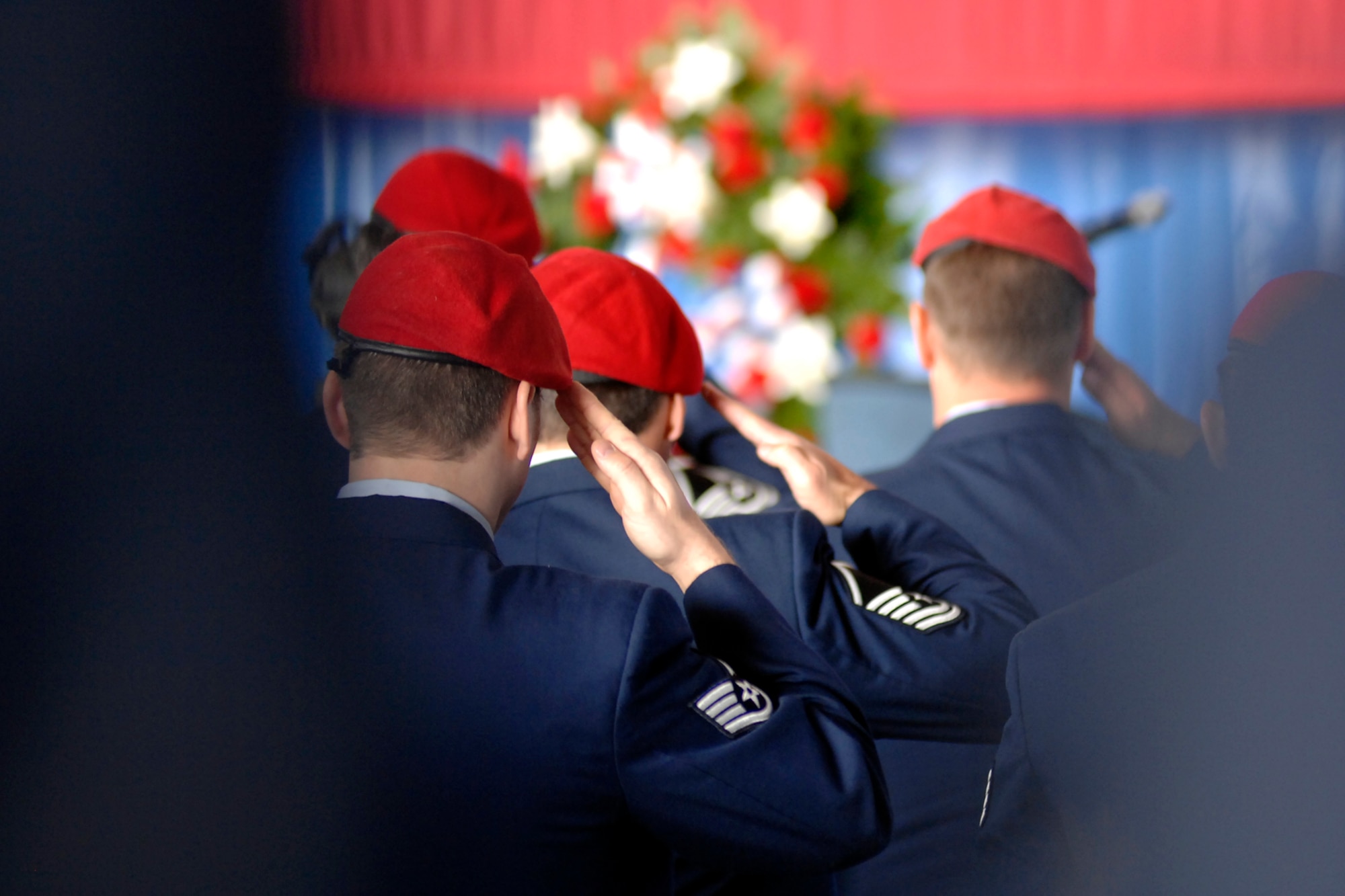 Mourners look on during the memorial ceremony for Tech. Sgt. William Jefferson Jr., 21st Special Tactics Squadron, at Hangar 4 on Pope Air Force Base March 26. Sergeant Jefferson died in support of Operation Enduring Freedom March 22. (U.S. Air Force Photo by Mike Murchison)