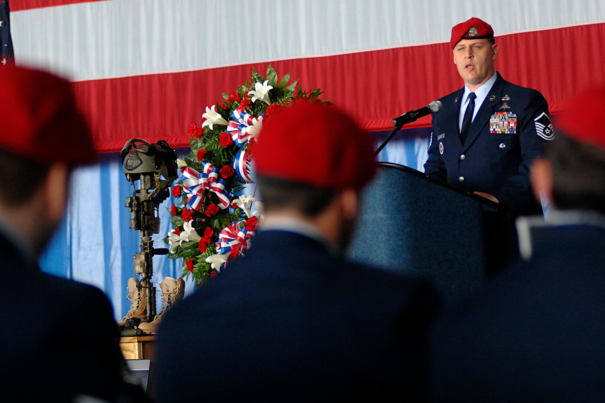 Master Sgt. Bill Adams speaks during the memorial ceremony for Tech. Sgt. William Jefferson Jr., 21st Special Tactics Squadron, at Hangar 4 on Pope Air Force Base March 26. Sergeant Jefferson died in support of Operation Enduring Freedom March 22. (U.S. Air Force Photo by Mike Murchison)
