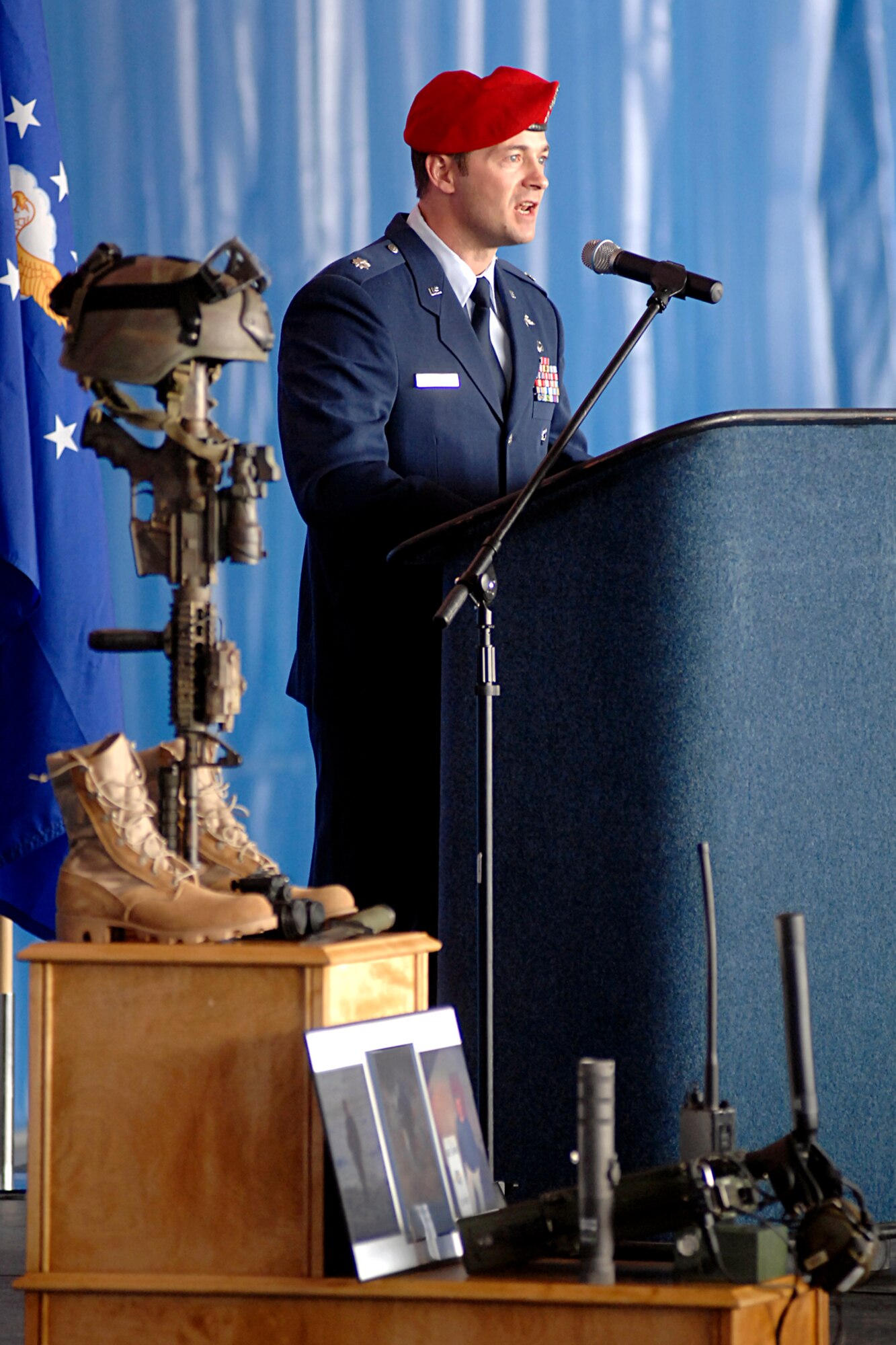 Lt. Col. Thaddeus Allen, 21st Special Tactics Squadron Commander, speaks during the memorial ceremony for Tech. Sgt. William Jefferson Jr., 21st STS, at Hangar 4 on Pope Air Force Base March 26. Sergeant Jefferson died in support of Operation Enduring Freedom March 22. (U.S. Air Force Photo by Mike Murchison)