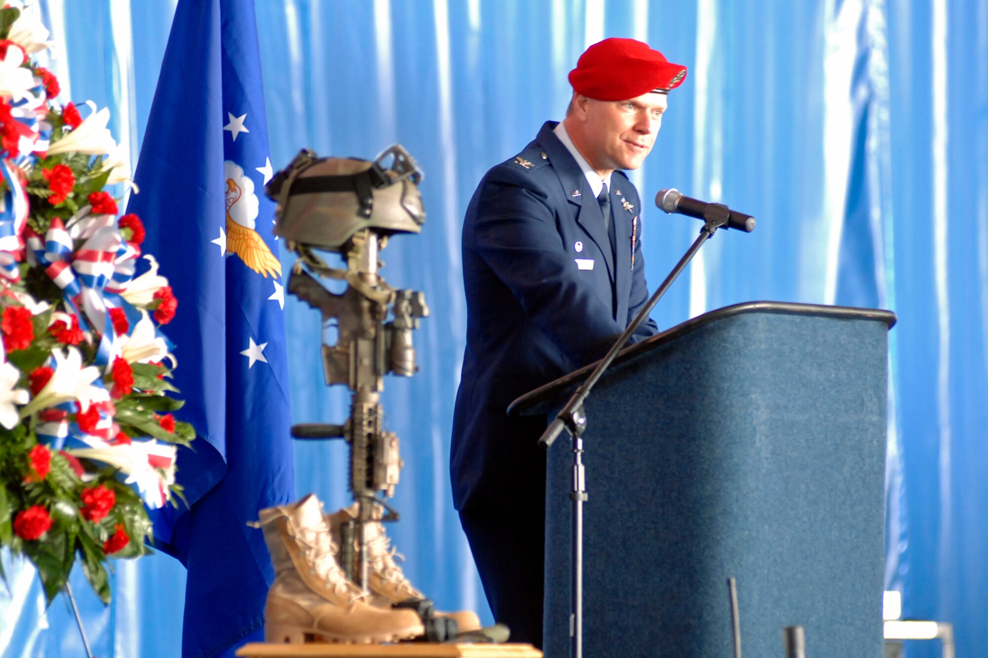 Col. Marc Stratton, 720th Special Tactics Group Commander, speaks during the memorial ceremony for Tech. Sgt. William Jefferson Jr., 21st Special Tactics Squadron, at Hangar 4 on Pope Air Force Base March 26. Sergeant Jefferson died in support of Operation Enduring Freedom March 22. (U.S. Air Force Photo by Mike Murchison)