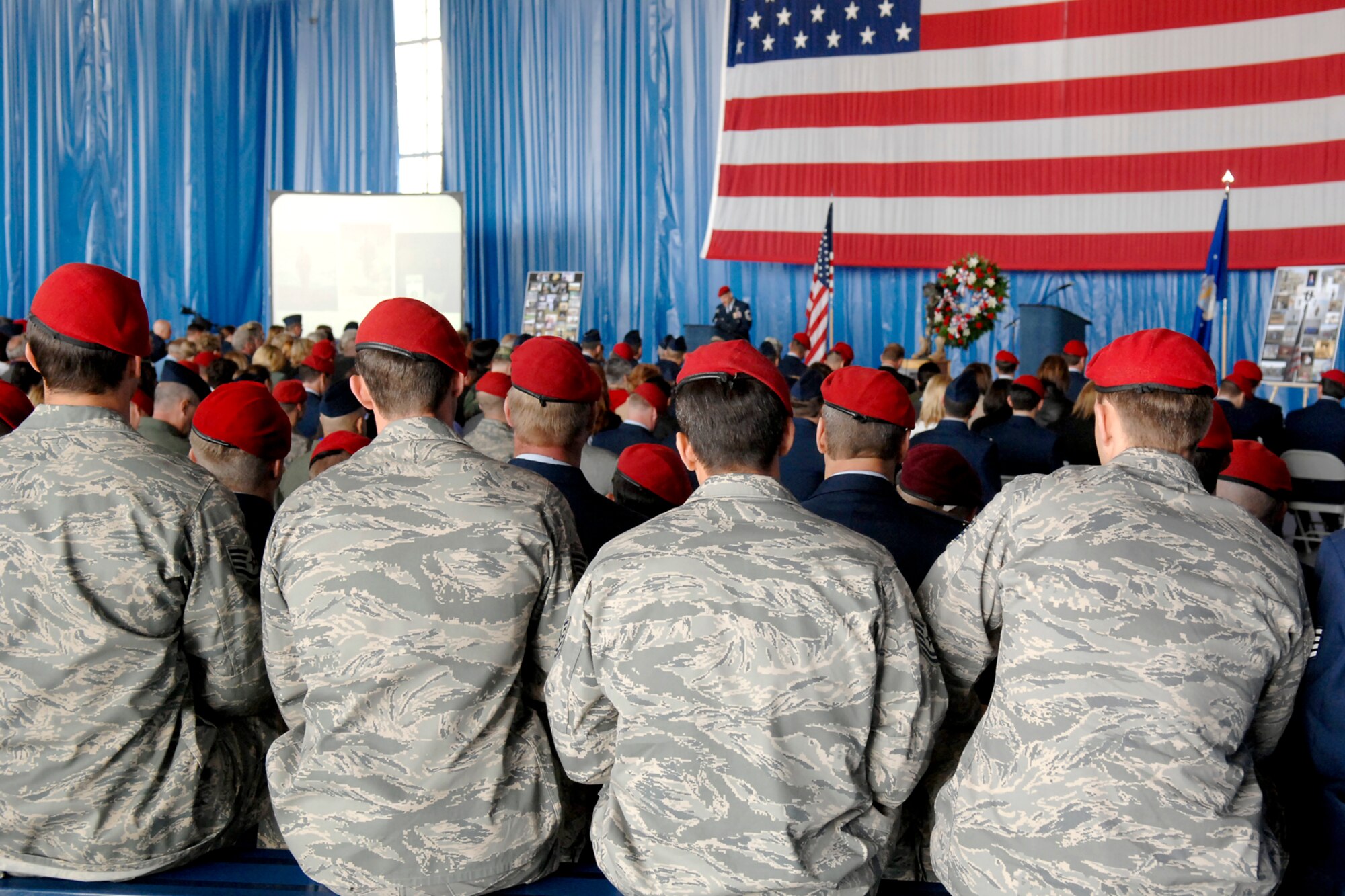 Mourners look on during the memorial ceremony for Tech. Sgt. William Jefferson Jr., 21st Special Tactics Squadron, at Hangar 4 on Pope Air Force Base March 26. Sergeant Jefferson died in support of Operation Enduring Freedom March 22. (U.S Air Force Photo by Mike Murchison)