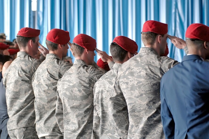 Mourners pay their respects during the memorial ceremony for Tech. Sgt. William Jefferson Jr., 21st Special Tactics Squadron, at Hangar 4 on Pope Air Force Base March 26. Sergeant Jefferson died in support of Operation Enduring Freedom March 22. (U.S. Air Force Photo by Mike Murchison)