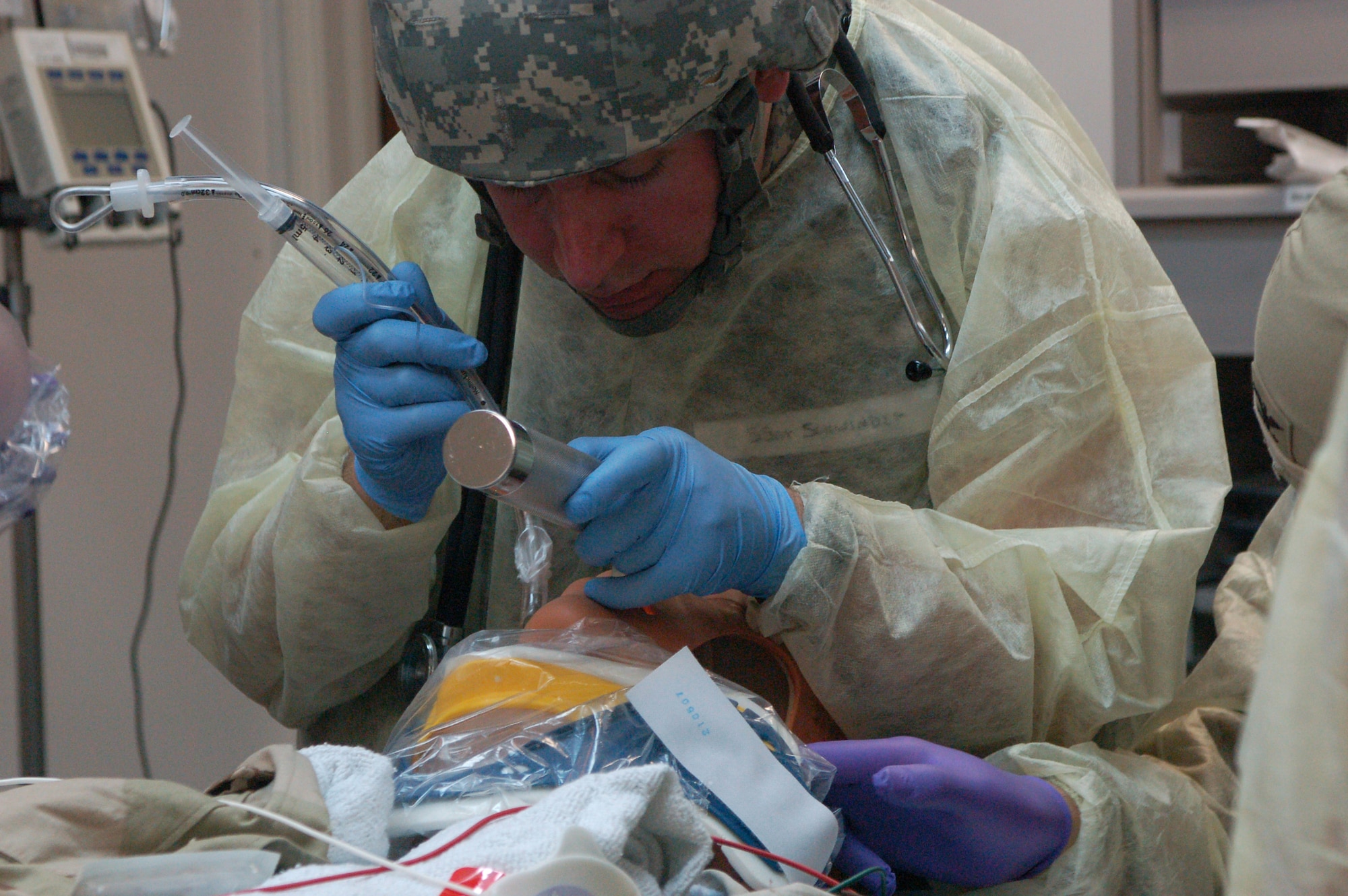 SATHER AIR BASE, Iraq -- Staff Sgt. Eric Schwinder, a medic with the 447th Expeditionary Medical Squadron, intubates a "patient" during a recent training exercise for members of the squadron here. (U.S. Air Force photo/Tech. Sgt. Amanda Callahan)