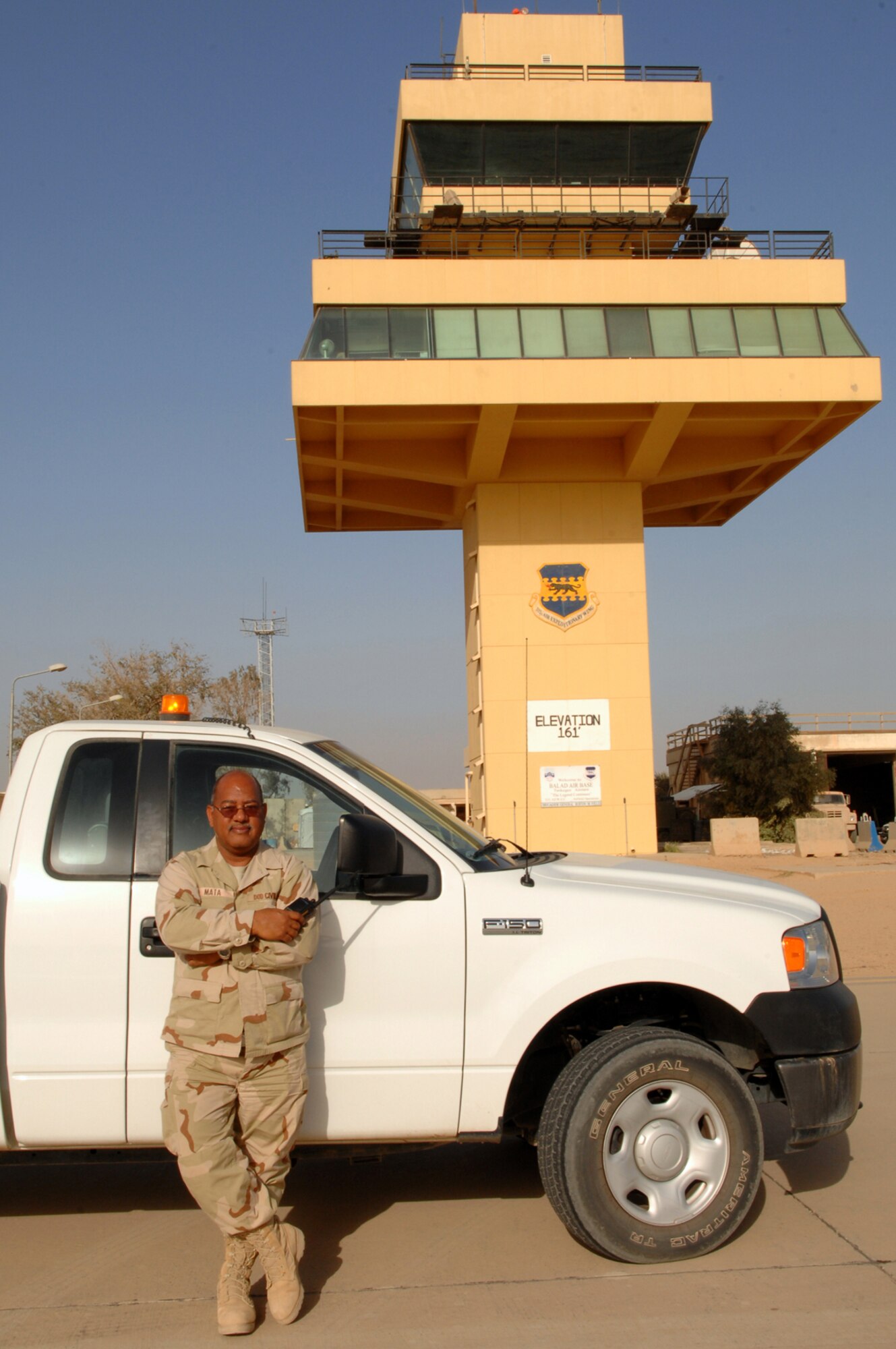 BALAD AIR BASE, Iraq -- Oseas Mata, 332nd Expeditionary Operations Support Squadron airfield manager, retired from the Air Force in 1991 as a master sergeant in airfield management. He returned to the career field in 1997 as a civil servant and works with Airmen here to ensure the airfield and runway are safe for aircraft arrivals and departures. Mr. Mata is deployed from Offutt Air Force Base, Neb. (U.S. Air Force photo/ Senior Airman Julianne Showalter)