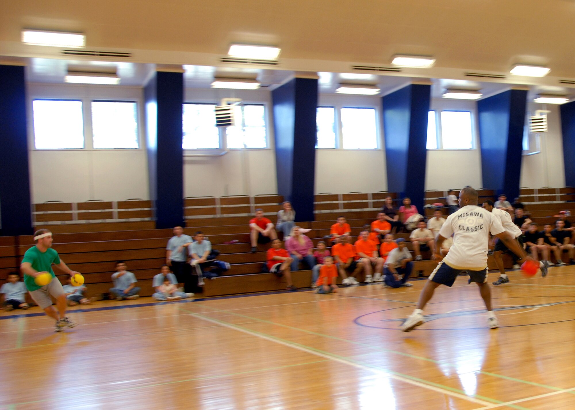MISAWA AIR BASE, Japan -- A Member of team "FSS" and "35DS"go head to head during a dodgeball tournament at the Potter Fitness Center March 23, 2008.  A total of 10 teams competed in the tournament sponsored by the Potter Fitness Center. (U.S. Air Force photo by Senior Airman Chad Strohmeyer)