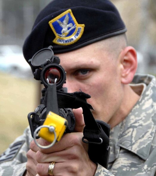 OSAN AIR BASE, Republic of Korea – Staff Sgt. Jack Gilbert, 51st Security Forces Squadron marksmanship course instructor, sets his sights downrange during a designated marksmanship course March 25. The course helps shooters fire more accurately at great distances. (U.S. Air Force photo/Senior Airman Christopher Boitz)