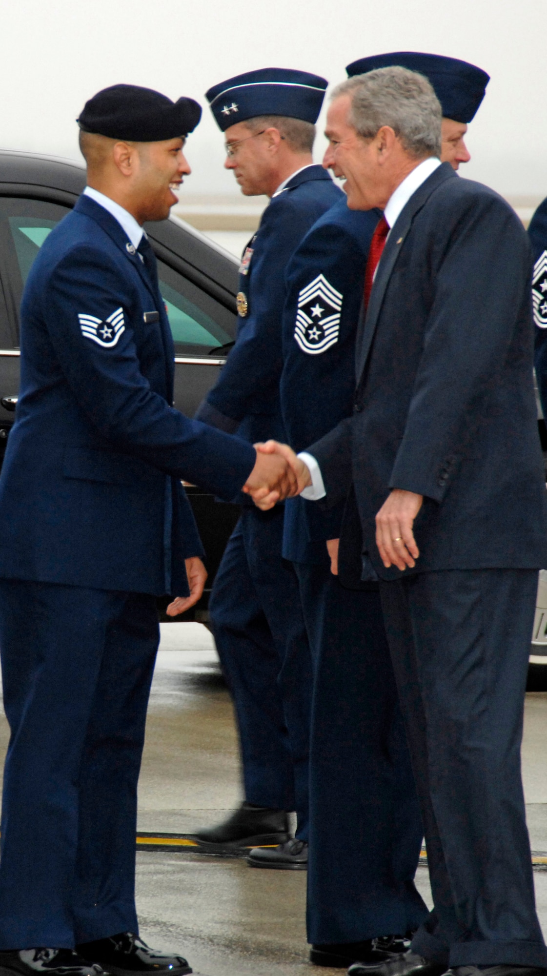 Upon his arrival at Wright-Patterson Air Force Base, Ohio, March 27, President George W. Bush greets Staff Sgt. Juan Rodriguez Jr., a recent recipient of the Purple Heart. Sergeant Rodriguez is assigned to the 88th Security Forces Squadron. (U.S. Air Force photo/Al Bright) 
