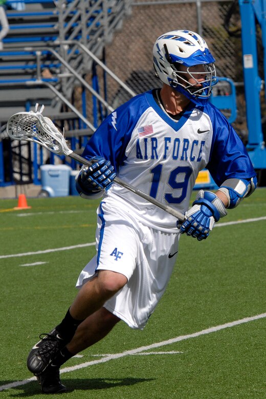 Air Force Academy junior midfielder Brian Massa looks upfield as he moves towards the visitor's goal.  In this lacrosse game March 25 Air Force defeated Presbyterian College 12-4 at the Cadet Lacrosse Stadium in Colorado Springs, Colo.  The Falcons, undefeated at home, move to 2-4 on the season.  (U.S. Air Force photo/Rachel Boettcher)