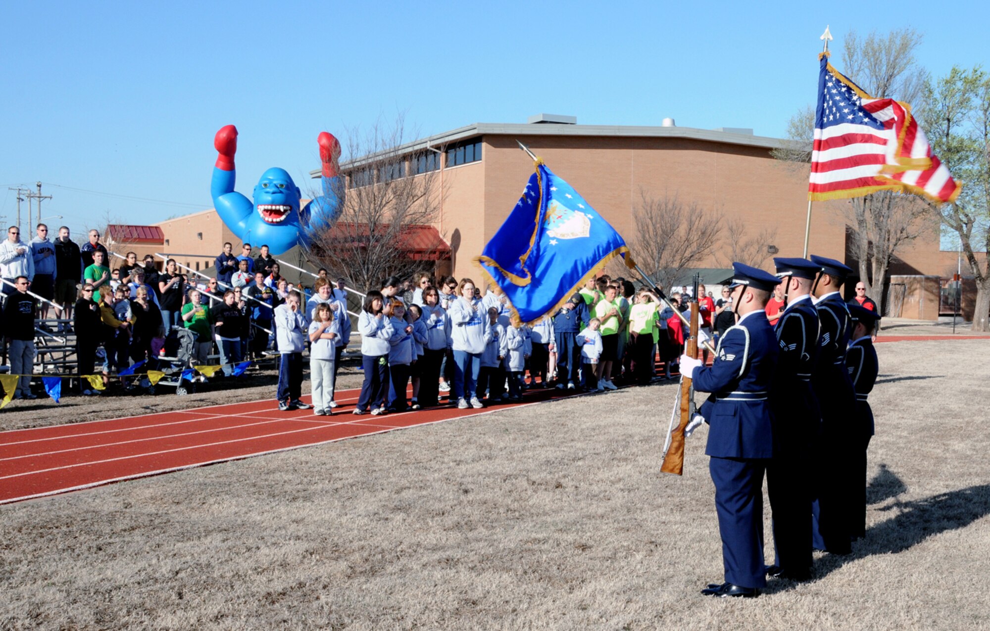 The Silver Talon Honor Guard present the colors during the opening ceremonies for 
the 2008 Area Six Special Olympics March 27 at Vance. This year there was more than 250 Special Olympians between the ages 8 and 82 from Grant, Garfield and Kay counties in Oklahoma participating in the day’s activities.  Competitions were held in track, field and wheelchair athletics.  Track athletics included wheelchair races, 25-meter walk and the 1-mile run. Field athletics included the shot put, softball throw, safety javelin and the long jump. Team Vance and the local community came together once again to ensure a memorable day of competition, camaraderie and fun for these very special athletes. 
