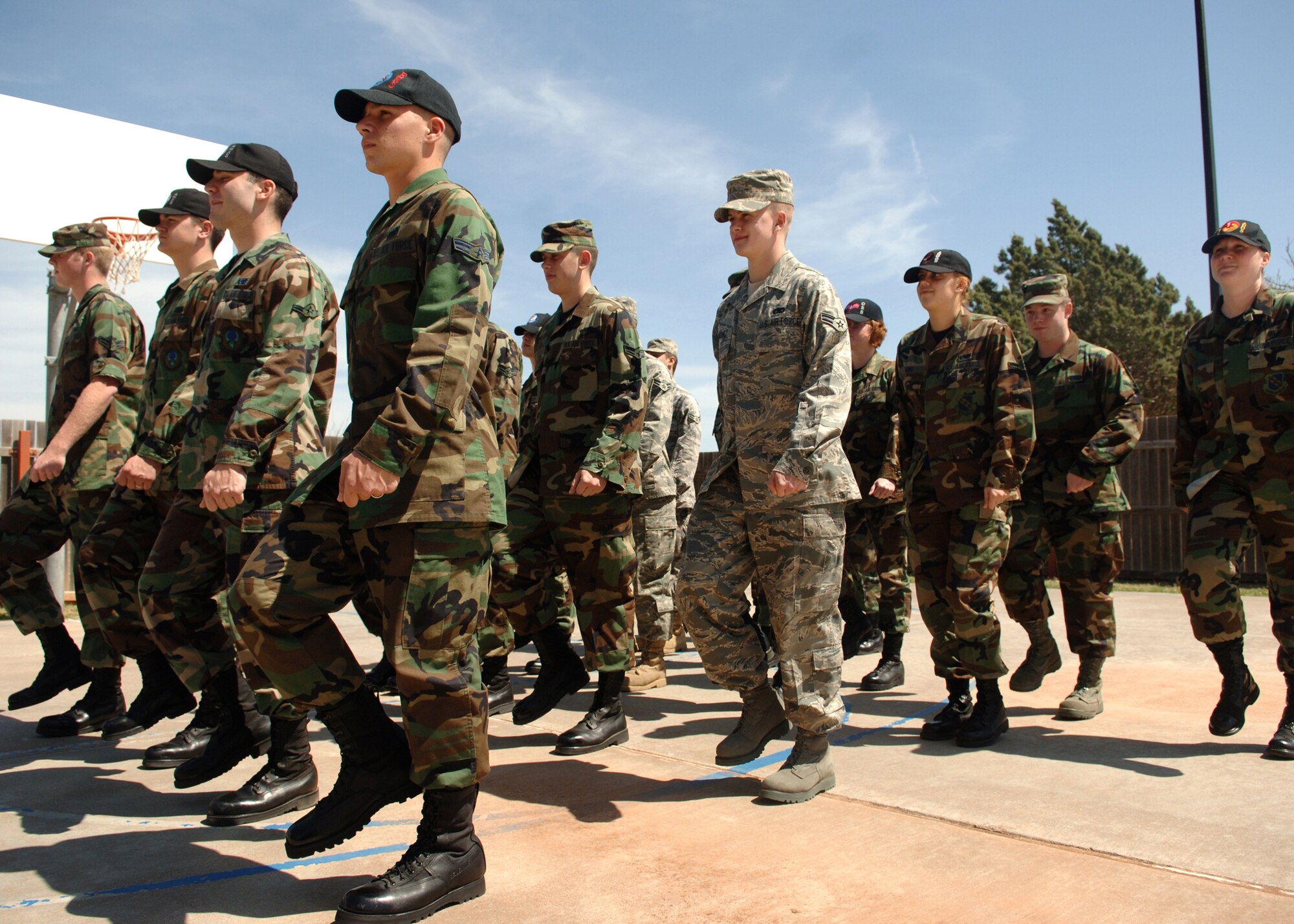 DYESS AIR FORCE BASE, Texas -- First Term Airmen perform drill routines on the drill pad outside of the Education Center, Mar. 26. The First Term Airmen brush up on their drill techniques regularly before going to their first unit. (U.S. Air Force Photo by Airman 1st Class Micheal Breaux)