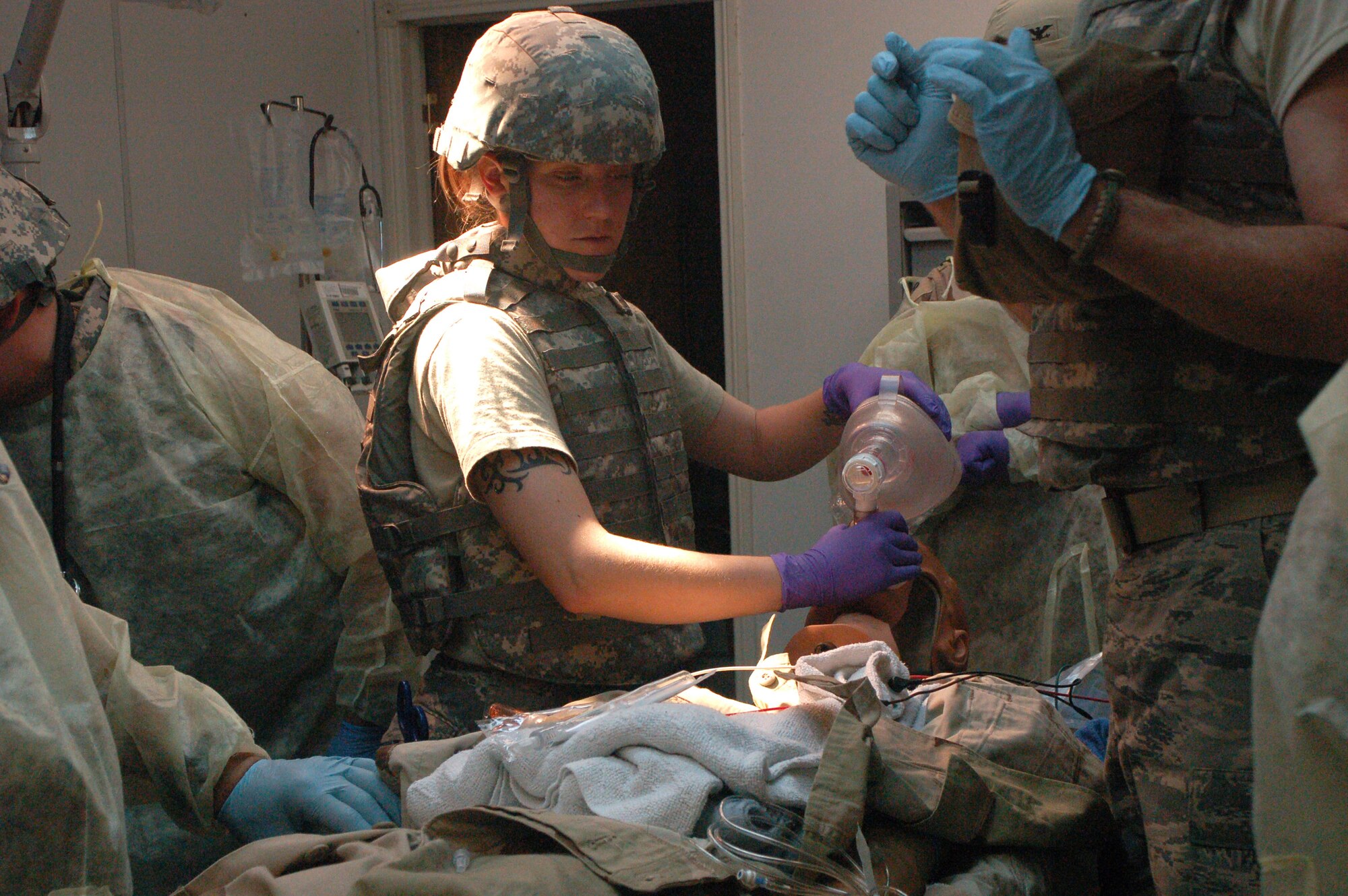 Staff Sgt. Jalayne Powers monitors a simulated patient during a recent training exercise for members of the 447th Expeditionary Medical Squadron. Sergeant Powers is a bioenvironmental technician. (U.S. Air Force photo/Tech. Sgt. Amanda Callahan) 