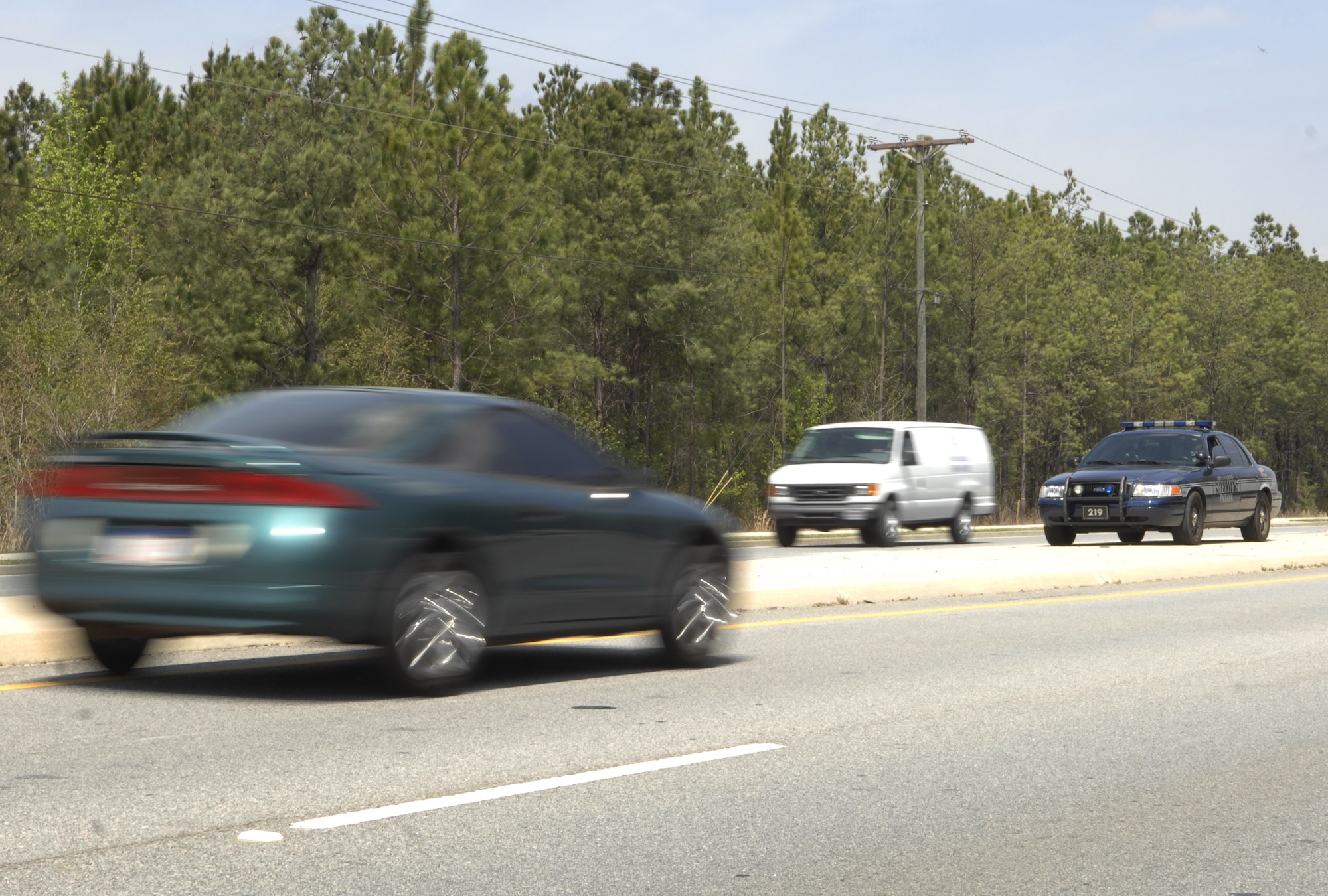 MOODY AIR FORCE BASE, Ga. – Deputy Raymond Devogt, Lowndes County Sheriff’s Office, patrols Bemiss Road here March 27.  Deputy Devogt and the LCSO constantly monitor area roads to ensure public saftey. (U.S. Air Force photo by Senior Airman Angelita Lawrence)