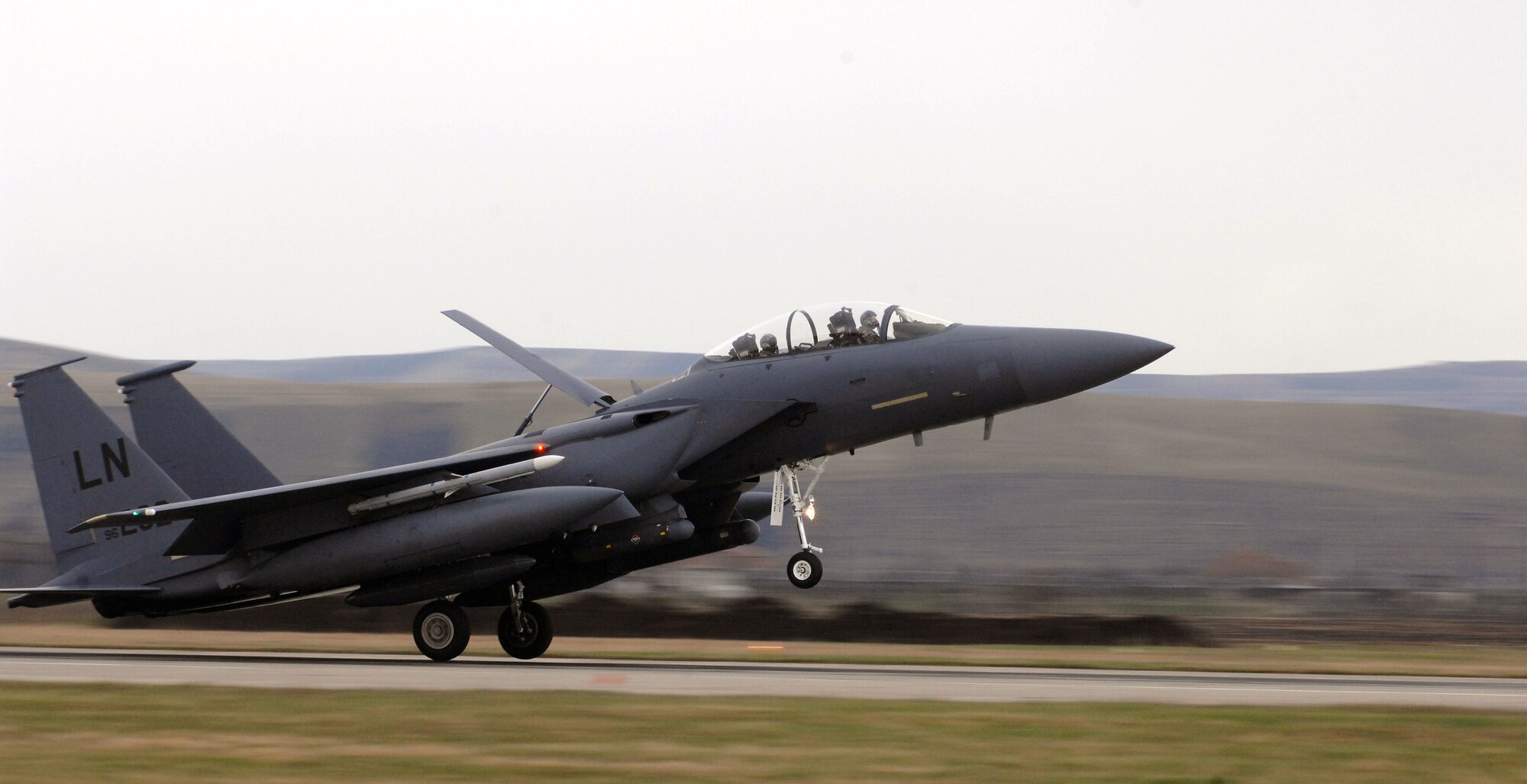 An F-15 Eagle from the 48th Fighter Wing at Royal Air Force Lakenheath, England, arrives March 25 at Campia Turzii, a Romanian airfield near Cluj, to support the NATO Summit to be held April 2 to 4 in Bucharest, Romanian. President George W. Bush will be among the world leaders attending the summit. (U.S. Air Force photo/Senior Airman Teresa M. Hawkins) 