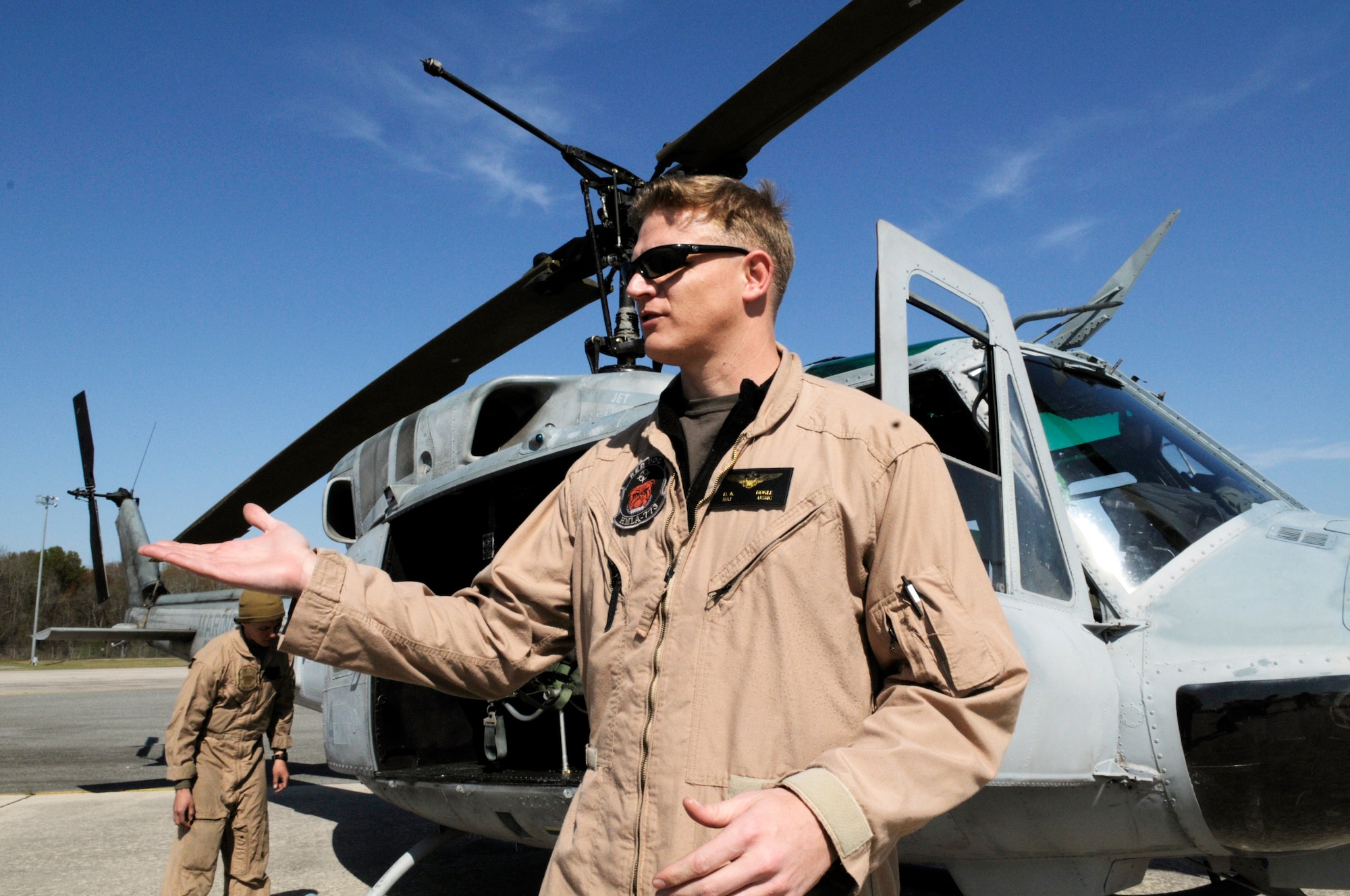 Maj. David Bogle, UH-1N pilot, talks about flying the helicopter. U. S. Air Force photo by Sue Sapp