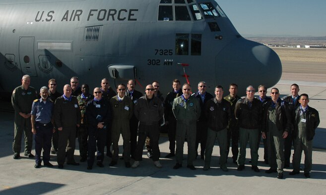 Col. Bob Chapman, 302nd Airlift Wing vice commander hosted a tour on 24 March for the Air Attaché program, comprised of numerous international forces.  The group toured the reserve units C-130 Hercules to learn about the variety of missions performed by reservist as Citizen Airmen. (U.S. Air Force photo/Ian Bebow) 
