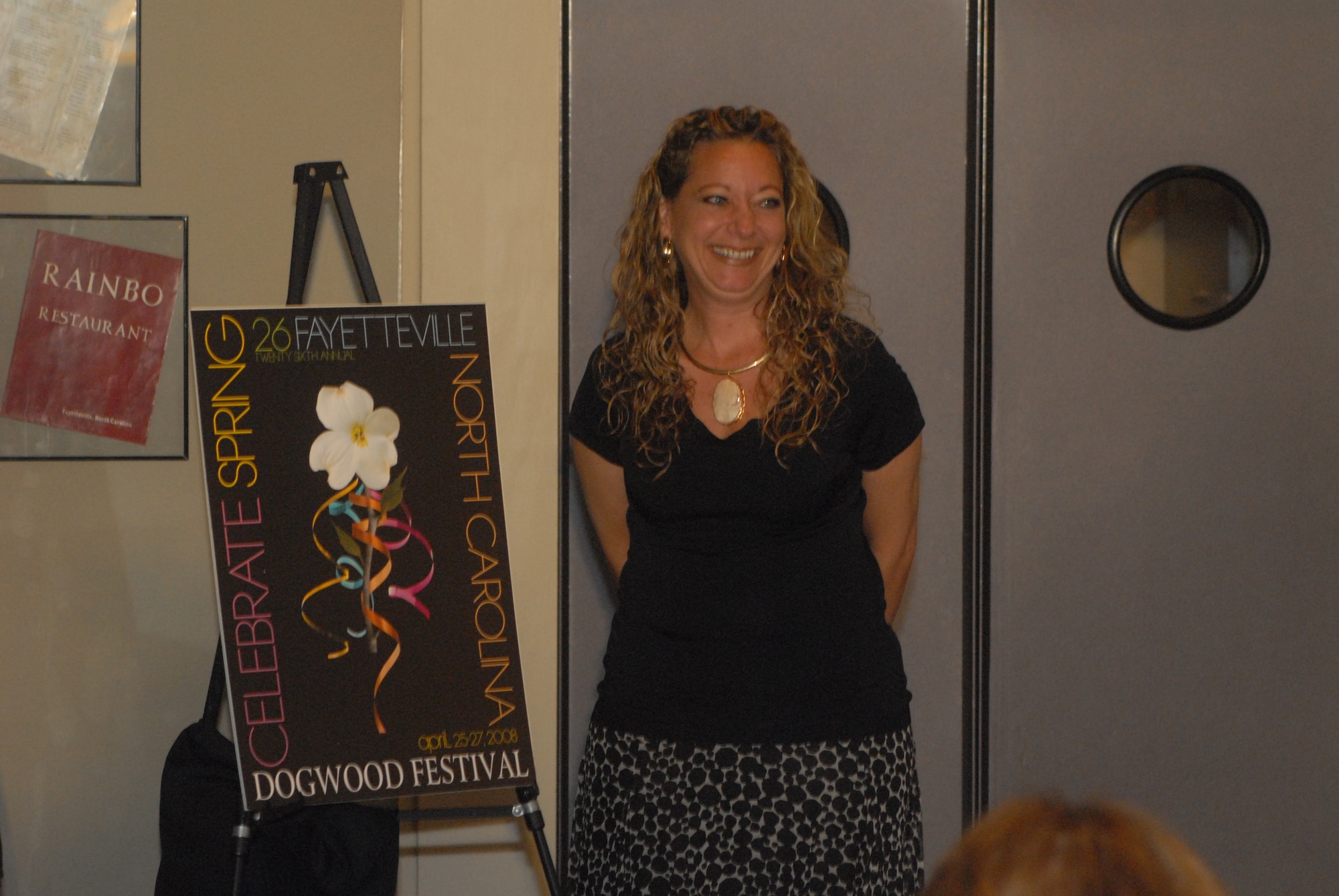 Anne Evanco, graphic artist, wins the poster contest to design the new logo for this year’s Fayetteville Dogwood Festival.
 (U.S. Air Force Photo by Staff Sgt. Jon LaDue)