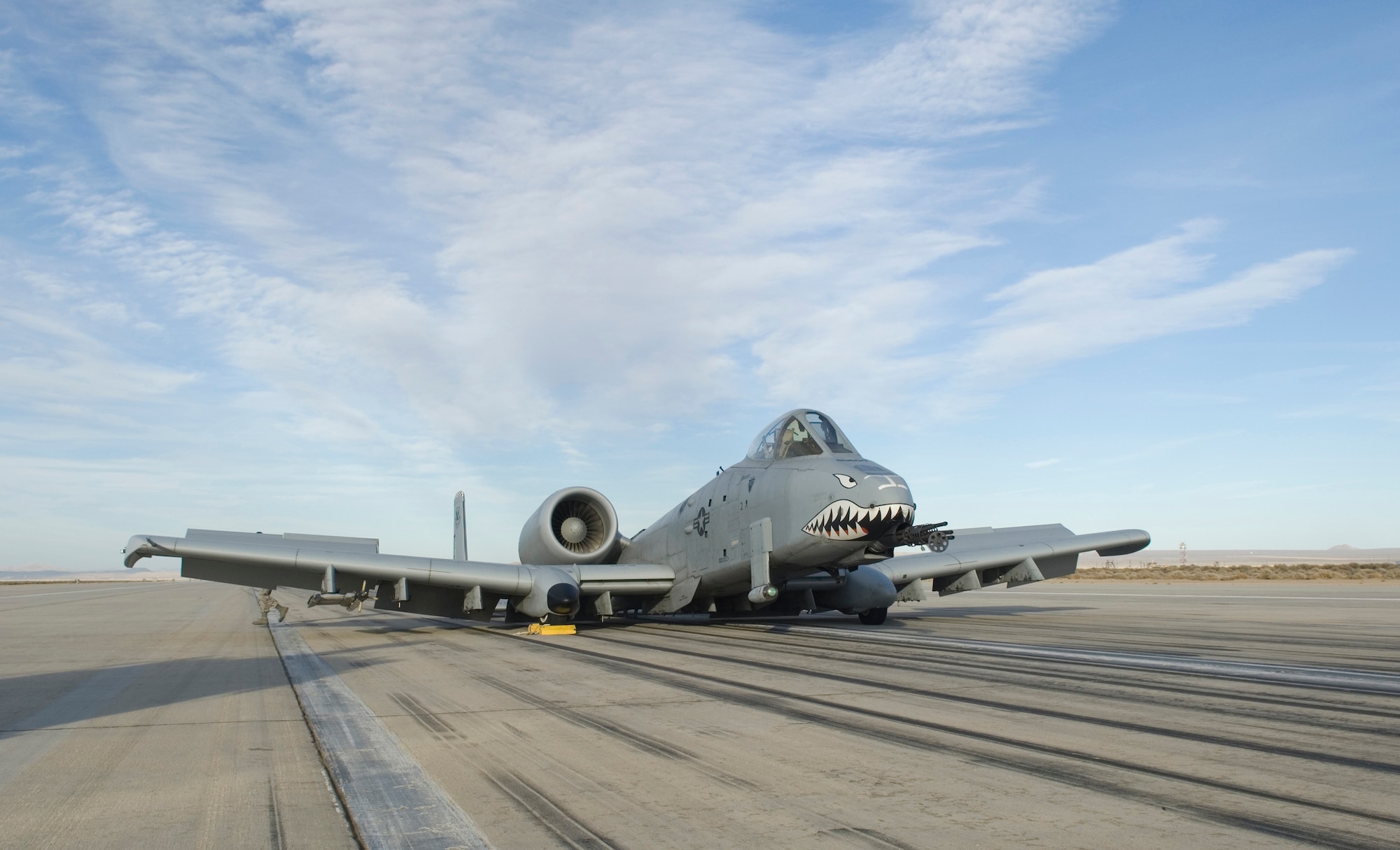 An A-10 from the 75th Fighter Squadron at Moody Air Force Base, Ga., sits on Runway 22 after making an emergency landing here Tuesday. The A-10 landed at Edwards with its landing gear in the up position after declaring an in-flight emergency. (Air Force photo by Brad White)