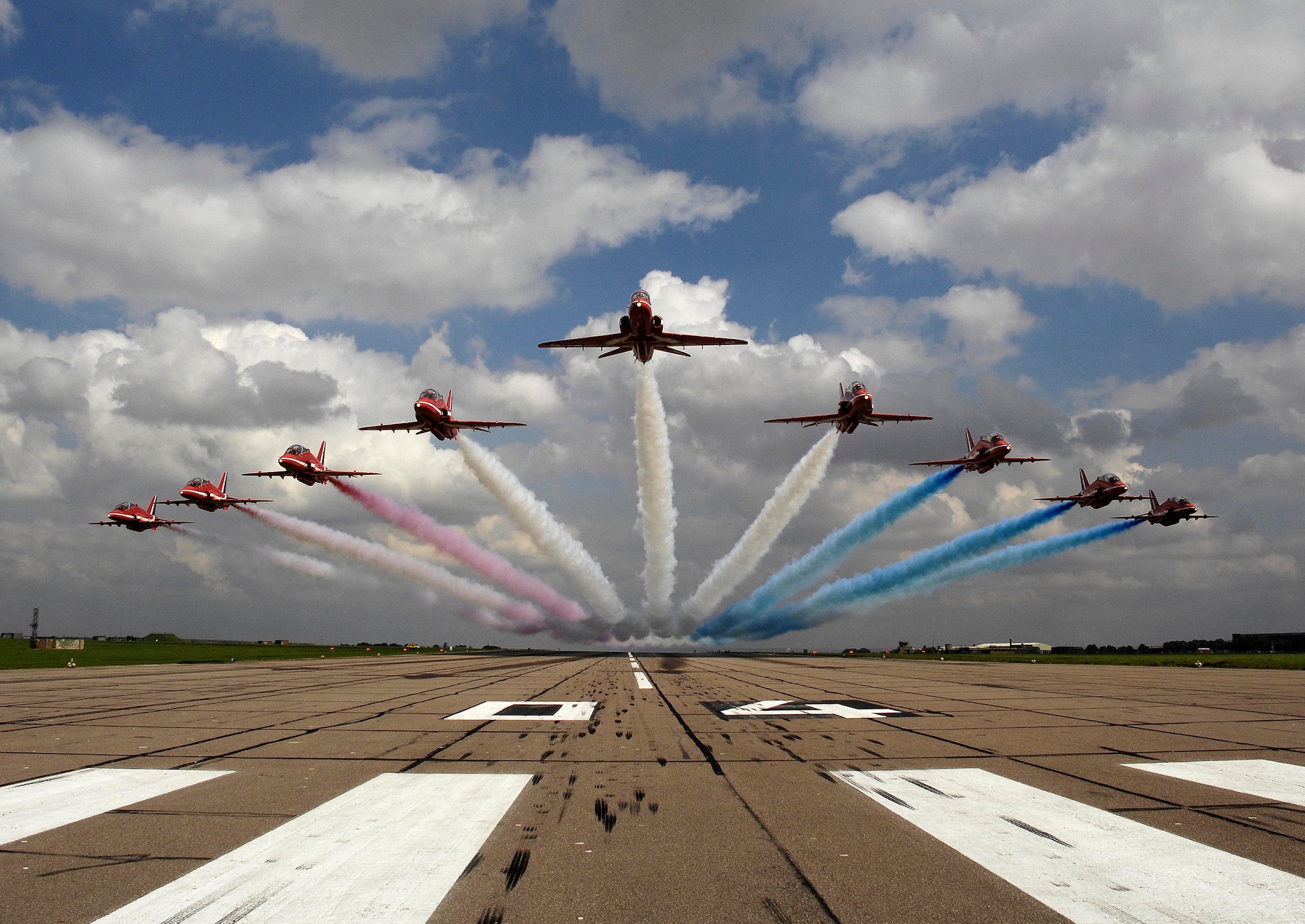 En route to London, nine Red Arrows and four Typhoons will fly over RAF Lakenheath April 1 at approximately 12:38 p.m. as part of the Royal Air Force 90th anniversary celebrations. © Crown Copyright/MOD