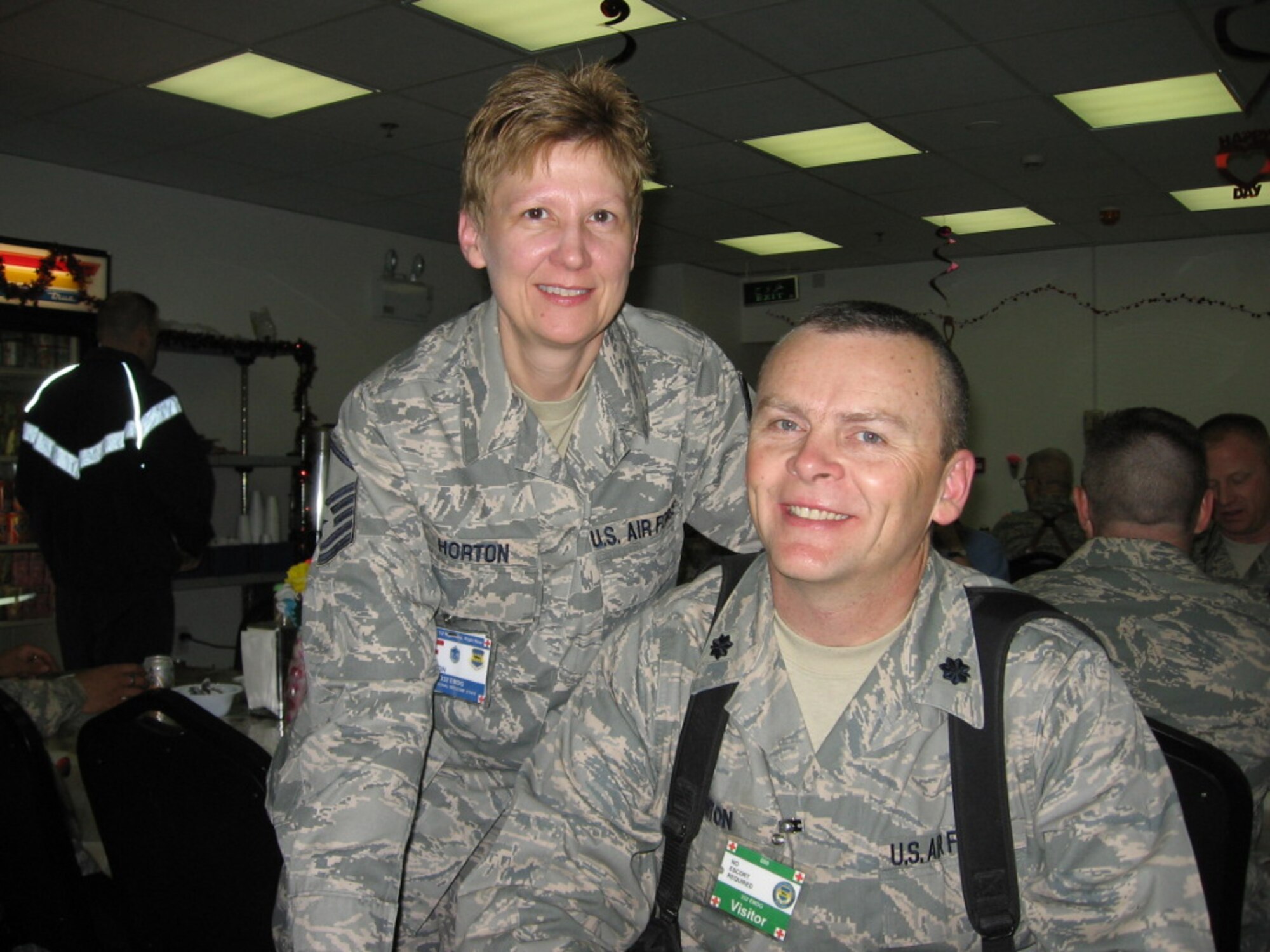 SEYMOUR JOHNSON AIR FORCE BASE, N.C. -- Lt. Col. Tim Horton poses with his wife, Master Sgt. Angela Horton while both are deployed to Iraq. Lt. Col. Horton is the commander of the 916th Communication Squadron, Air Force Reserve, and Sergeant Horton is a diet technician with the 145th Medical Group, North Carolina Air National Guard.
