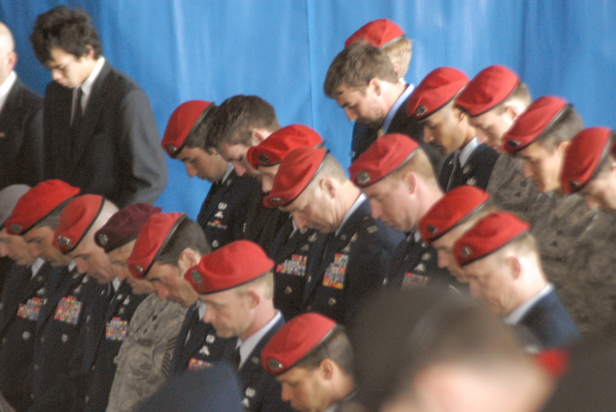 Mourners pay their respects during the memorial ceremony for Tech. Sgt. William Jefferson March 26 at Hangar 4 at Pope Air Force Base, N.C. Sergeant Jefferson died in support of Operation Enduring Freedom March 22. Sergeant Jefferson was assigned to the 21st Special Tactics Squadron. (U.S. Air Force photo/2nd Lt. Chris Hoyler) 
