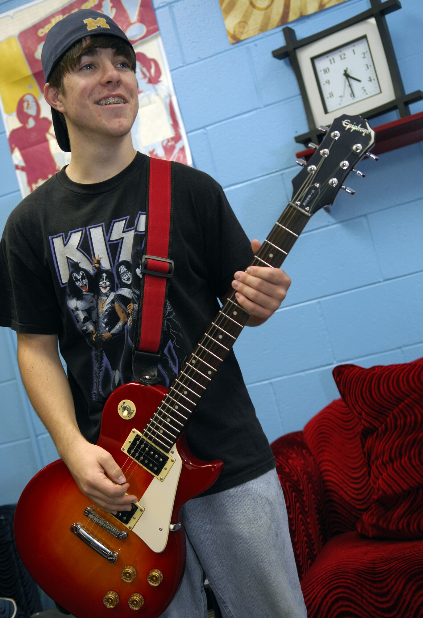 MOODY AIR FORCE BASE, Ga, -- Michael Brunelle, 2007 Youth of the Year award winner, plays his guitar at the Youth Center here March 26. The Boys and Girls Club of America awarded Mr. Brunelle this award for his good academics, involvement in youth programs and his community service. (U.S. Air Force photo by Senior Airman Elizabeth Rissmiller)