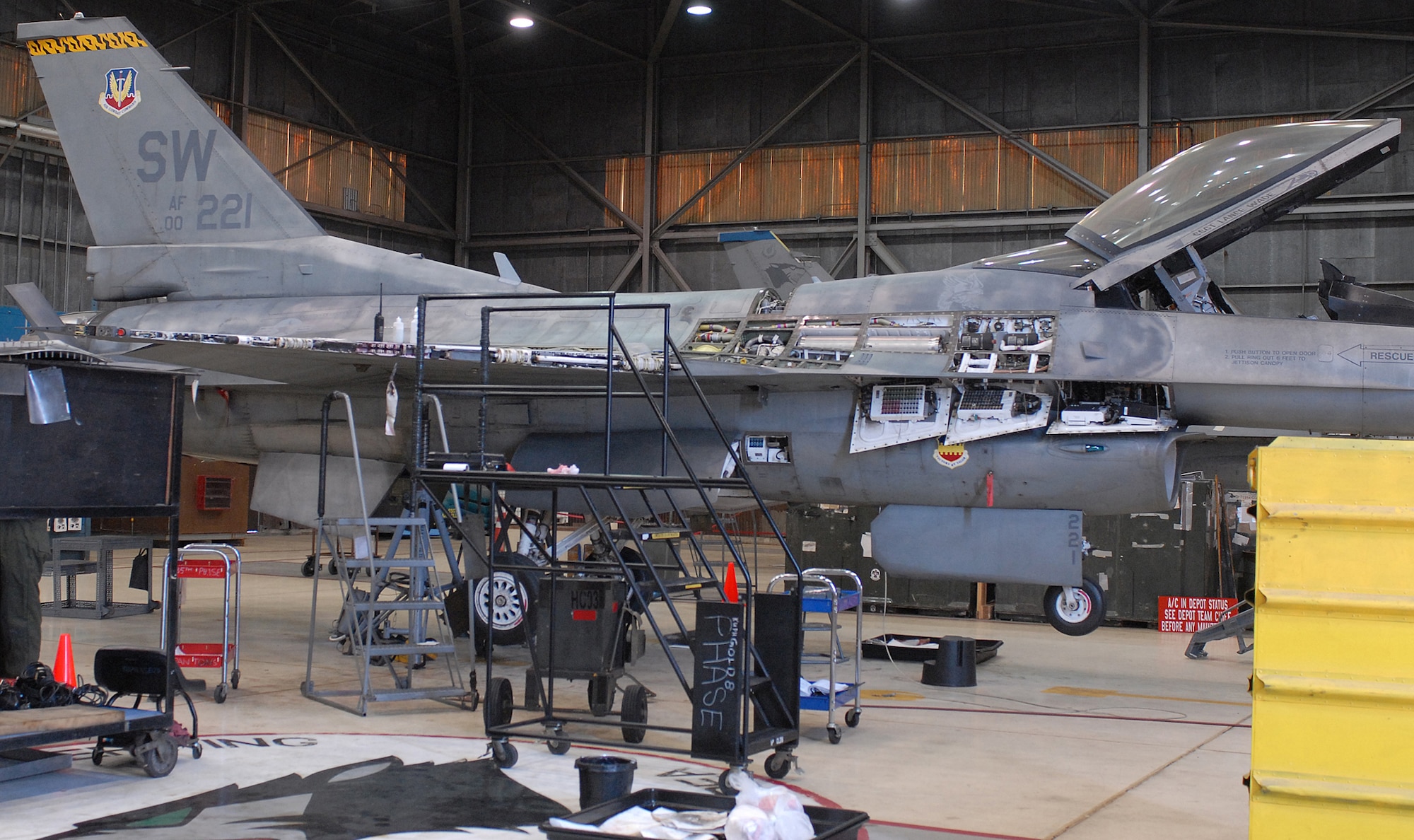 KUNSAN AIR BASE, Republic of Korea -- An F-16 is being dismantled for maintenance here March 25.  Every 400 hours, an aircraft goes through phase inspection, which extends its life span and prevents damages from day-to-day operations.  (U.S. Air Force photo/Senior Airman Giang Nguyen)

