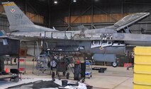 KUNSAN AIR BASE, Republic of Korea -- An F-16 is being dismantled for maintenance here March 25.  Every 400 hours, an aircraft goes through phase inspection, which extends its life span and prevents damages from day-to-day operations.  (U.S. Air Force photo/Senior Airman Giang Nguyen)

