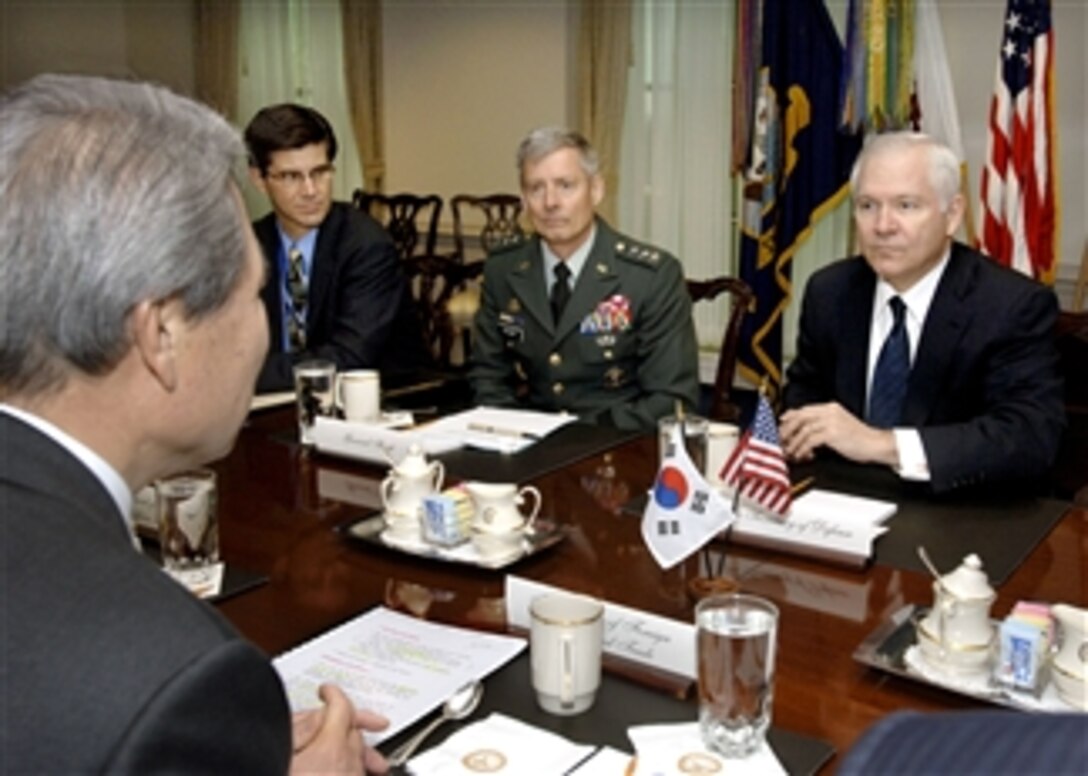 Secretary of Defense Robert M. Gates (right) hosts a Pentagon meeting with South Korean Minister of Foreign Affairs and Trade Yu Myung-hwan (left) on March 27, 2008.  Also attending the meeting are Joint Staff Director Lt. Gen. Walter L. Sharp (2nd from right), U.S. Army, and Principal Deputy Assistant Secretary of Defense for East Asia John Hill (3rd from right).  