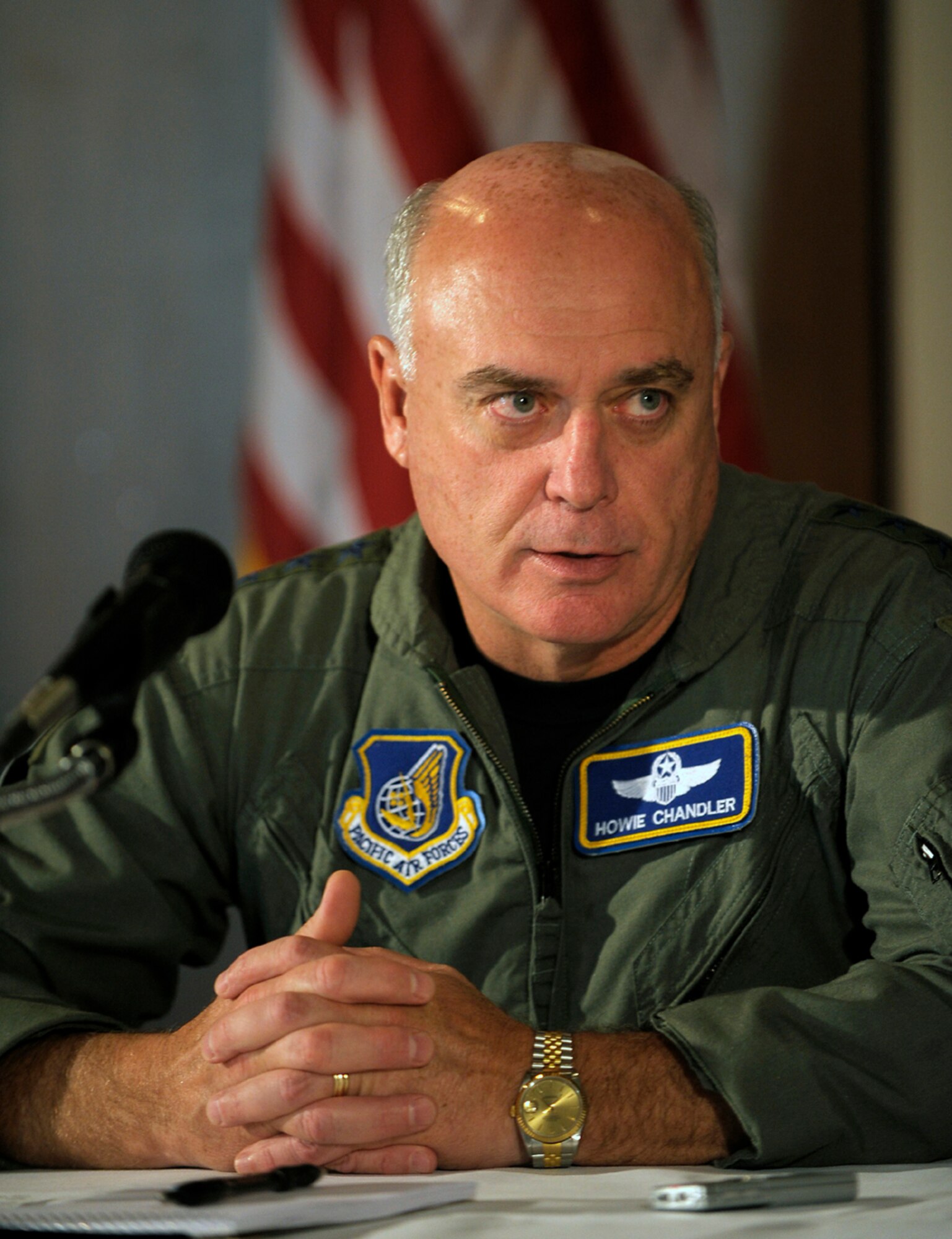 General Carrol H. "Howie" Chandler, Pacific Air Forces commander, answers questions from local media during a press event at Elmendorf Air Force Base, Alaska, March 27. Local media members from Anchorage queried the Hawaii based  commander on a number of topics, to include the recent increase in Russian aircraft intercepts, PACAF's continuing role in Operations Enduring/Iraqi Freedom, and what the  Air Force is doing to meet the challenges of today and tomorrow. (U.S. Air Force photo/Master Sgt. Keith Brown)