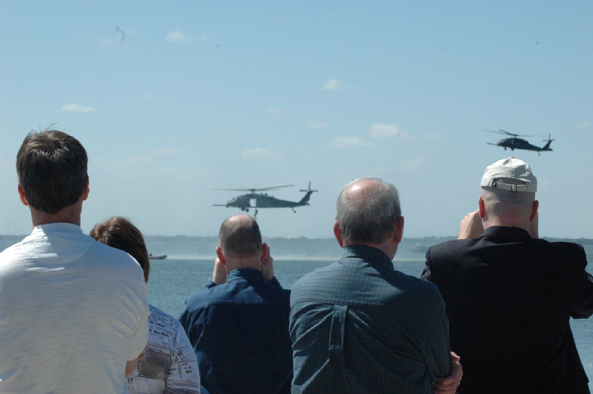 GRISSOM AIR RESERVE BASE, Ind., -- Civic leaders from Indiana watch in awe as members of the 920th Rescue Wing, Patrick AFB, Fla., demonstrate combat search and rescue operations.  The stop at Patrick was part of a two-day trip to enhance the civic leaders' knowledge of various Department of Defense missions. (U.S. Air Force photo/Senior Airman Carl Berry)