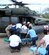 SOTO CANO AIR BASE, Honduras--Honduran emergency medical technicians unload injured passangers from a Joint Task Force-Bravo UH-60 Blackhawk MEDEVAC Easter Sunday.  The Blackhawk, dispatched from JTF-Bravo to the bus crash site near Cholutecca, Honduras and transported the injured to Hospital Escuela in the Honduran capital Tegucigalpa.     