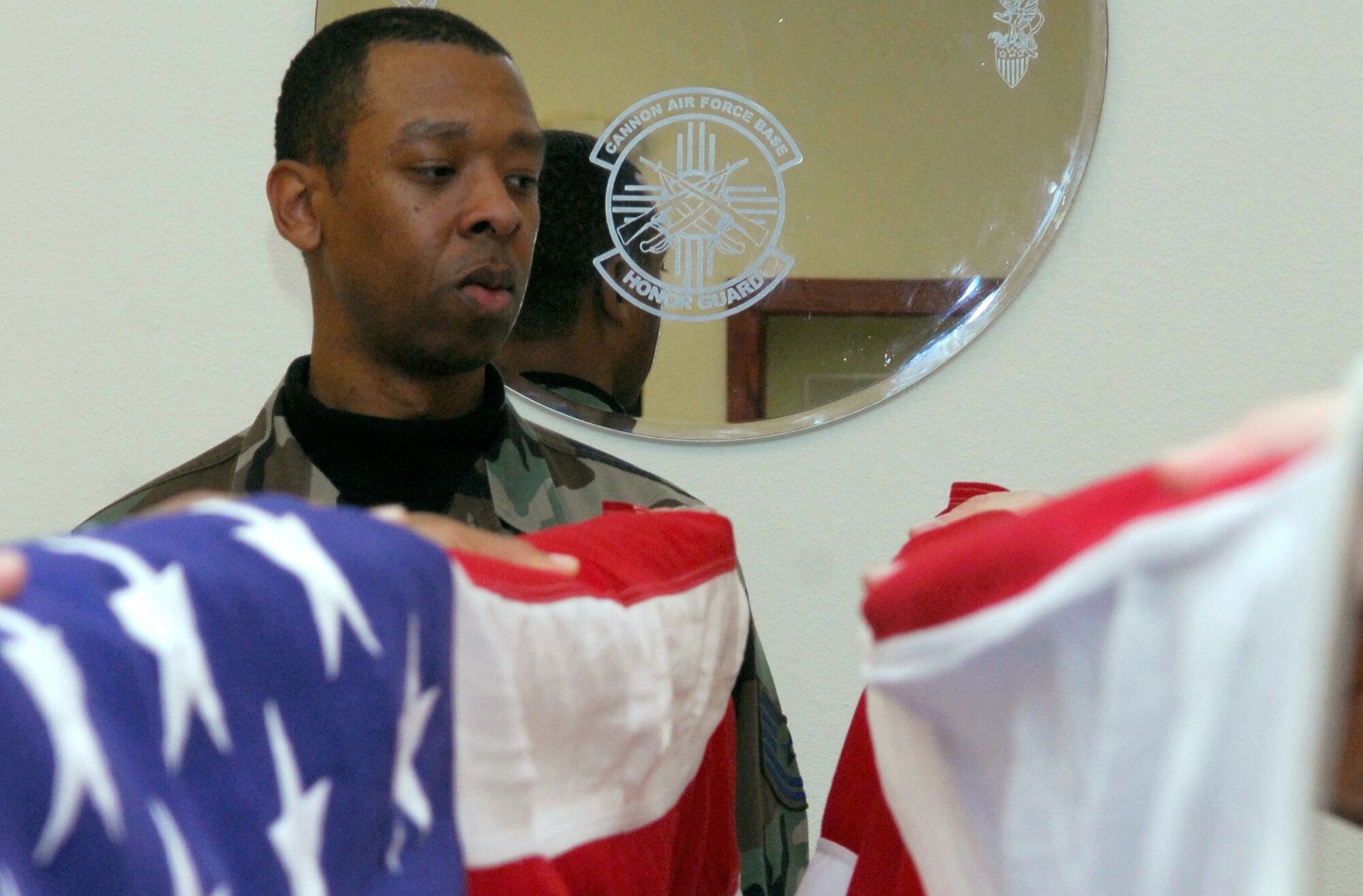 CANNON AIR FORCE BASE, N.M. - Tech. Sgt. Rodney Barner, 27th Special Operations Services Squadron, watches over some of his Airmen in training at the base honor guard. Sergeant Barner was named the Air Force Special Operations Command Honor Guard Base Program Manager of the Year. (U.S. Air Force photo by Airman 1st Class Erik Cardenas)