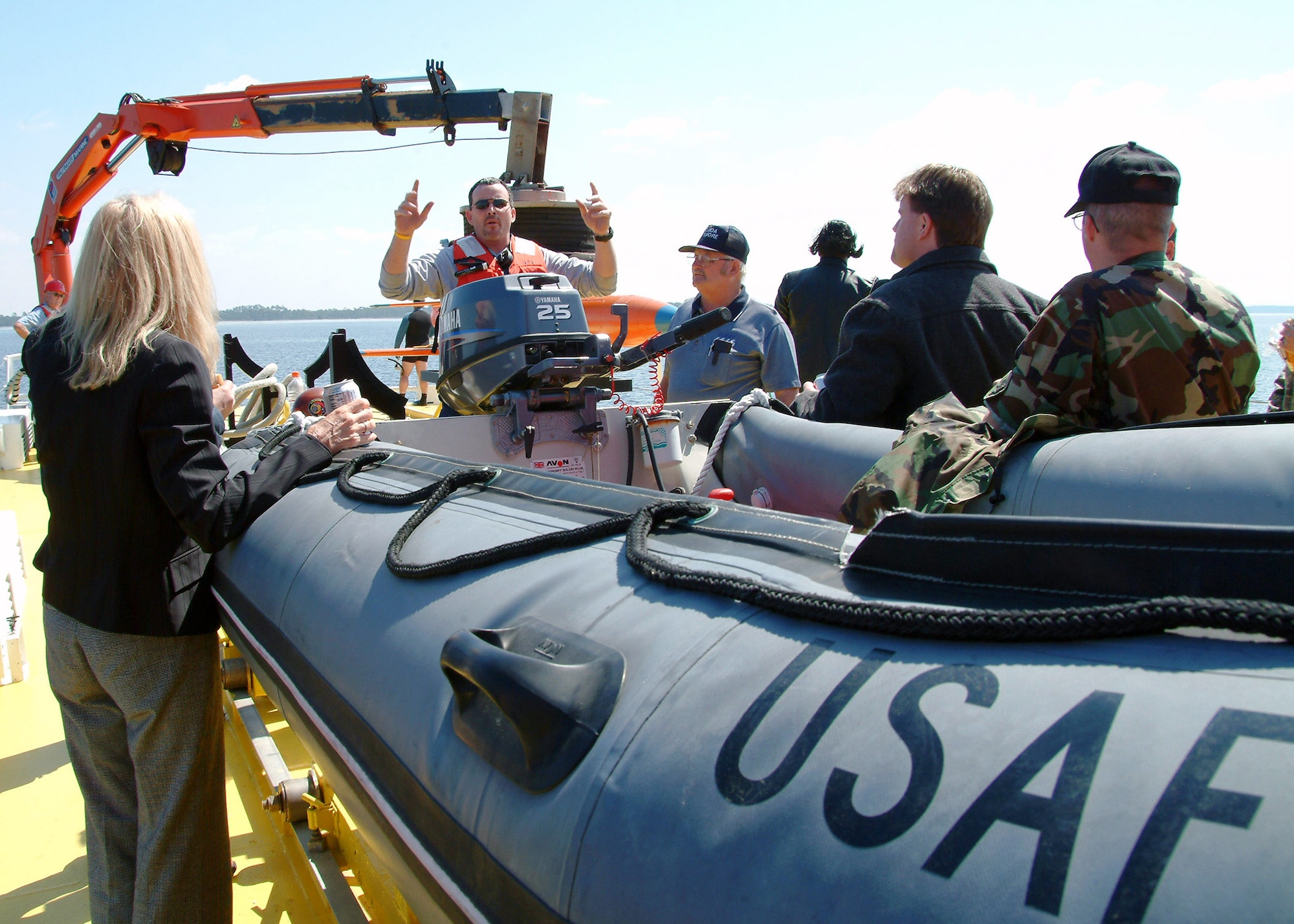 John Wise briefs a tour group on sub-scale drone recovery before his team performs a demonstration March 26 in the waters off of Tyndall Air Force Base, Fla. The ship used for recovery is one of only three 120-foot boats owned by the Air Force. They are contracted through the 82nd Aerial Targets Squadron to help recover sub-scale drones after they are shot down during live fire exercises. (U.S. Air Force photo/Staff Sgt. Samuel King Jr.) 