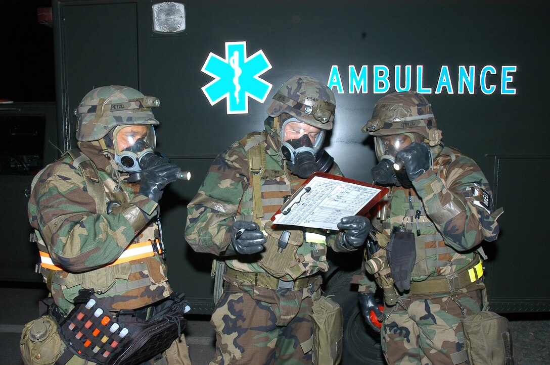 Members of the 353rd Operations Support Squadron Medical Flight conduct a building sweep during an operational readiness inspection at Daegu Air Base, Korea.  From left are: Technical Sgt. Sixto Vargas, Staff Sgt. Eric Weatherholt and Master Sgt. Ali Rivers.  The squadron is part of the 353rd Special Operations Group and members are stationed at Kadena Air Base, Japan.                                